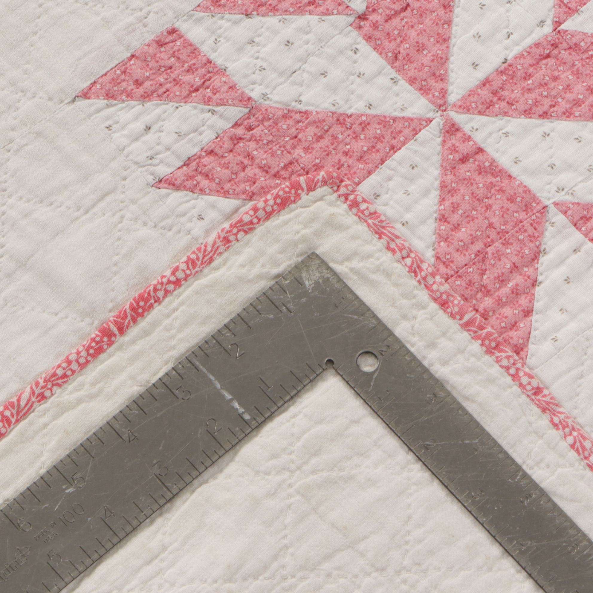 Hand-Crafted Pink and White Eight-Point Star Quilt