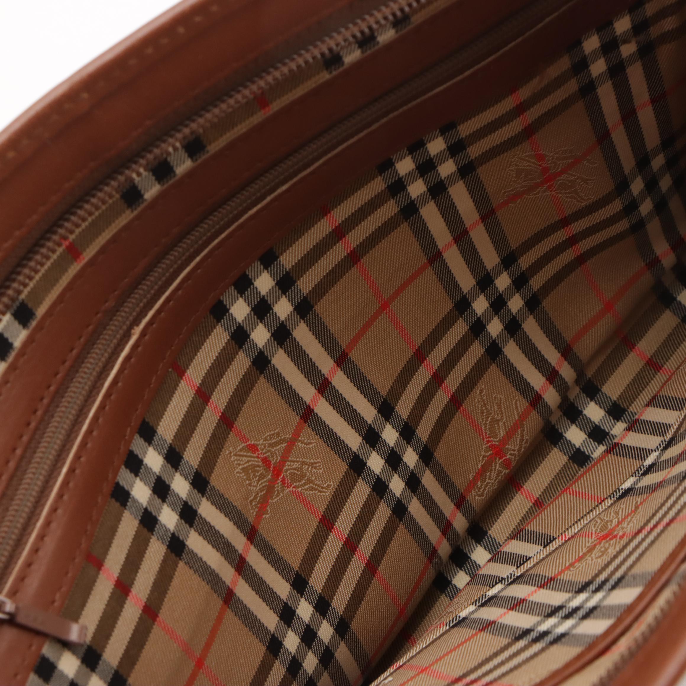 Burberrys Leather Clutch Purse with Haymarket Check Lining