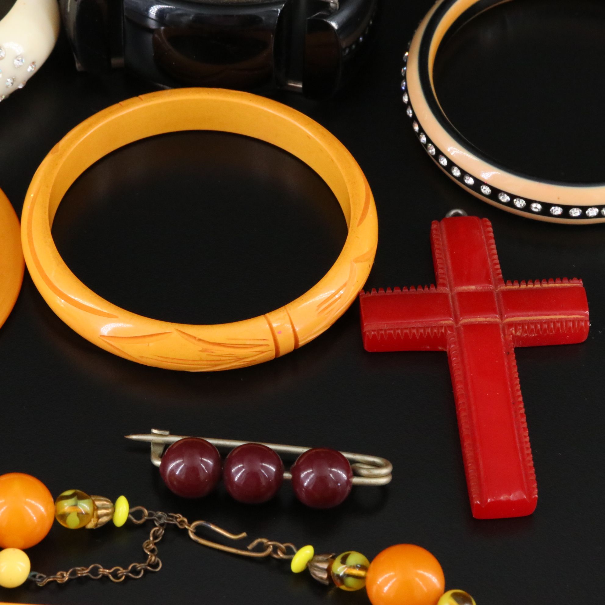 Early Plastic Jewelry Collection Including Bakelite and Celluloid