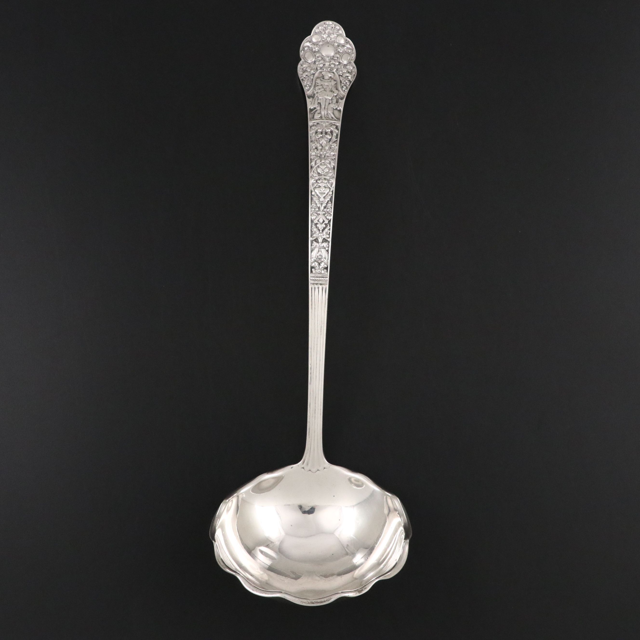 Gorham Sterling Silver Repoussé Ladle, Late 19th Century
