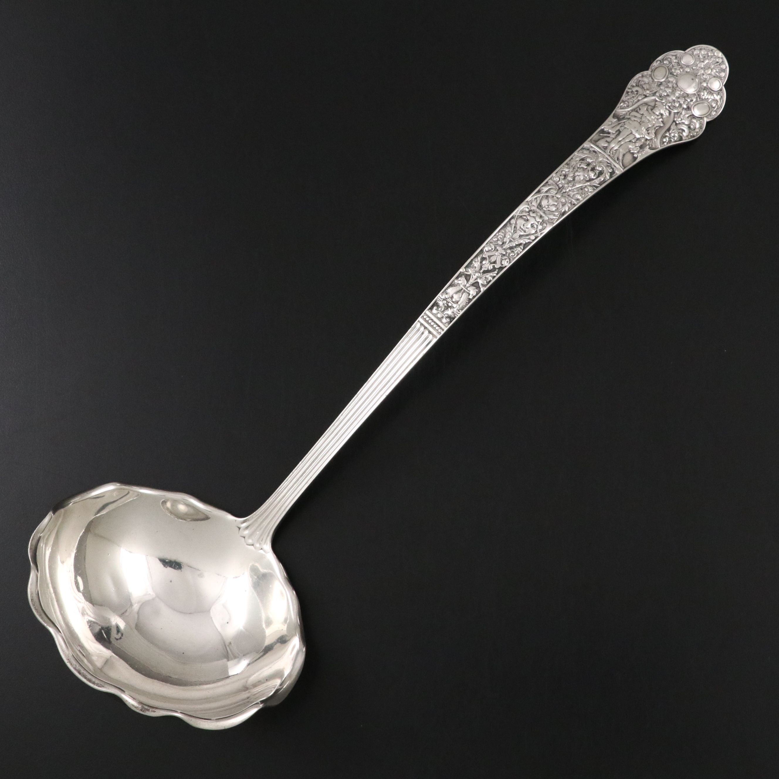 Gorham Sterling Silver Repoussé Ladle, Late 19th Century