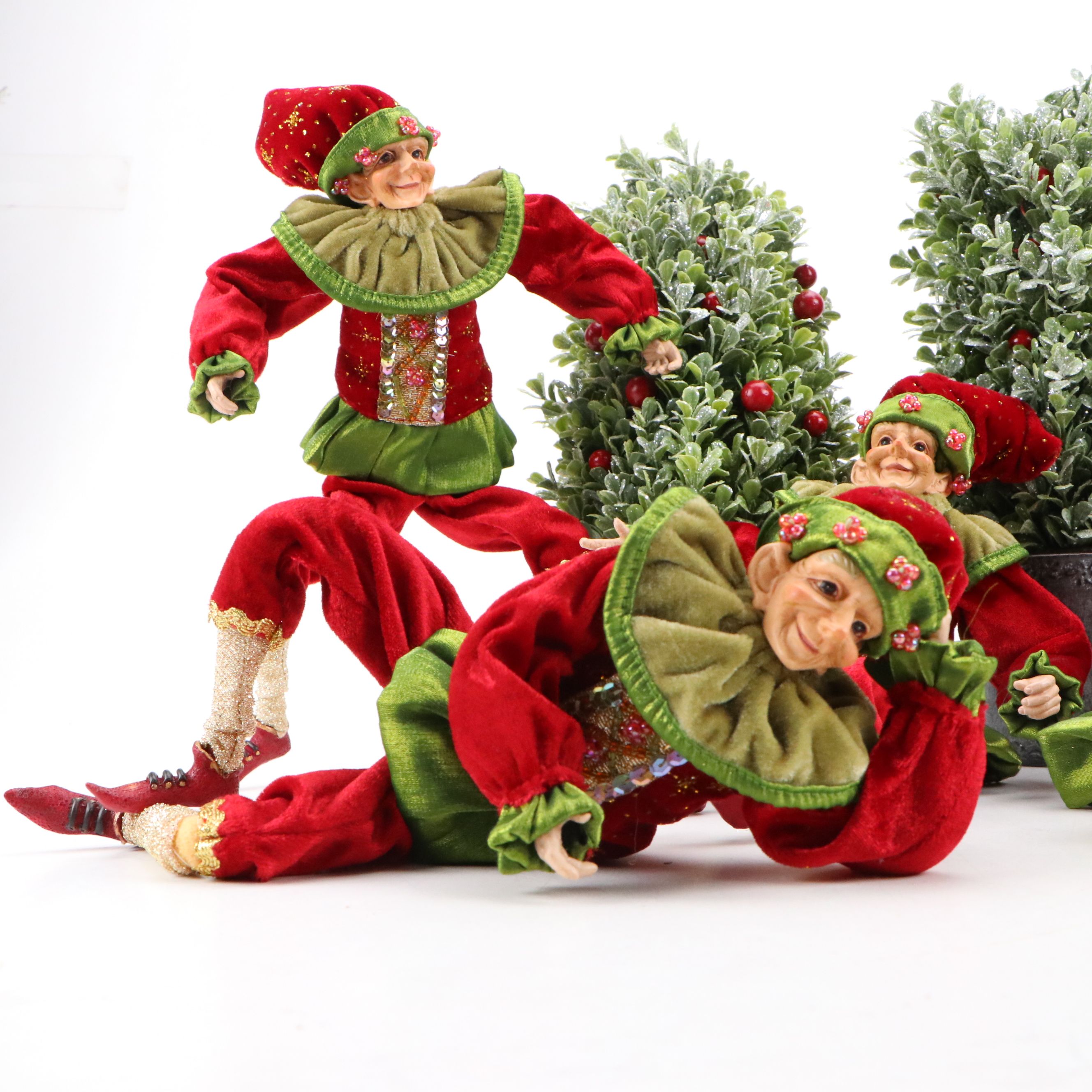 Articulated Elf Tabletop Décor with Holly Berry Artificial Shrubs