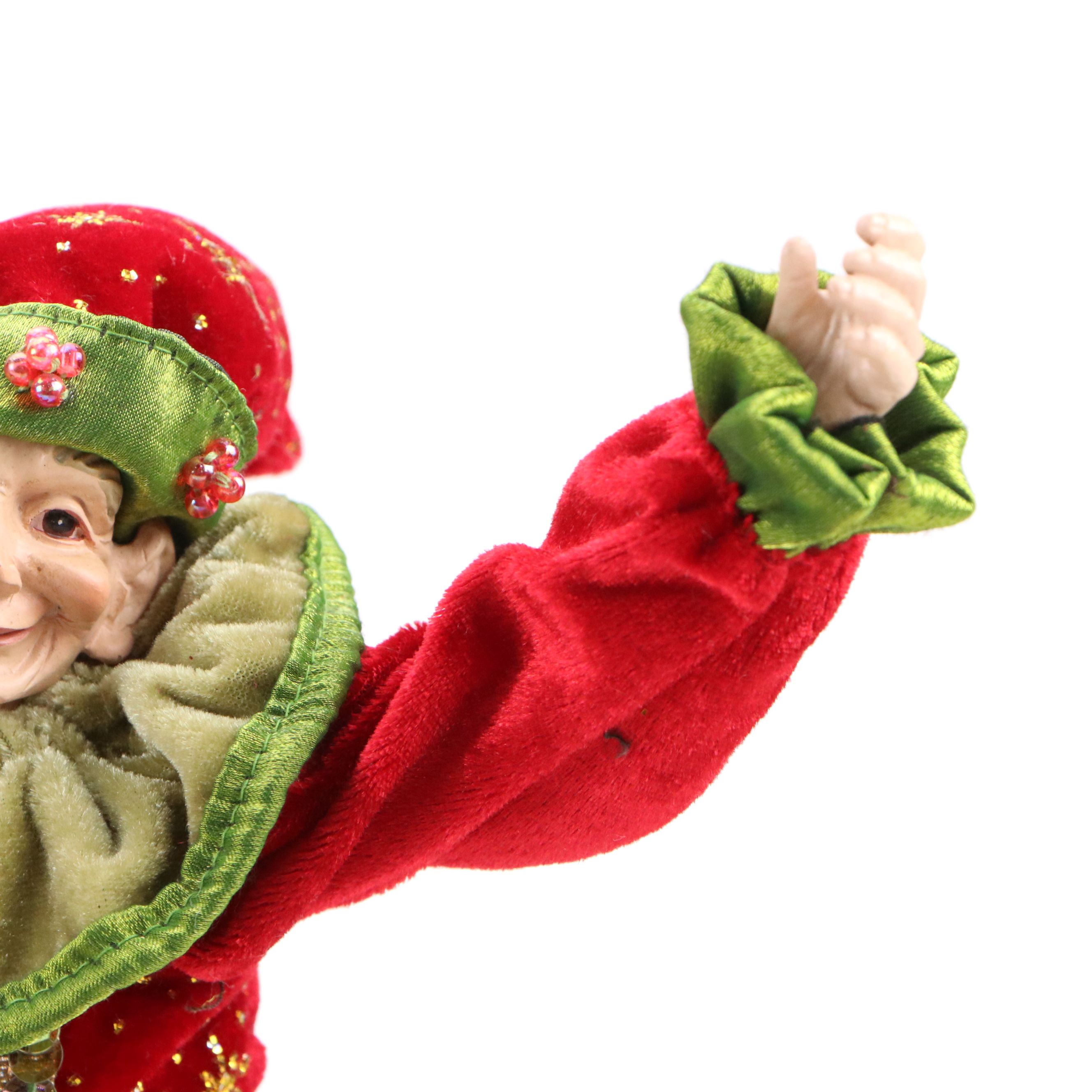 Articulated Elf Tabletop Décor with Holly Berry Artificial Shrubs