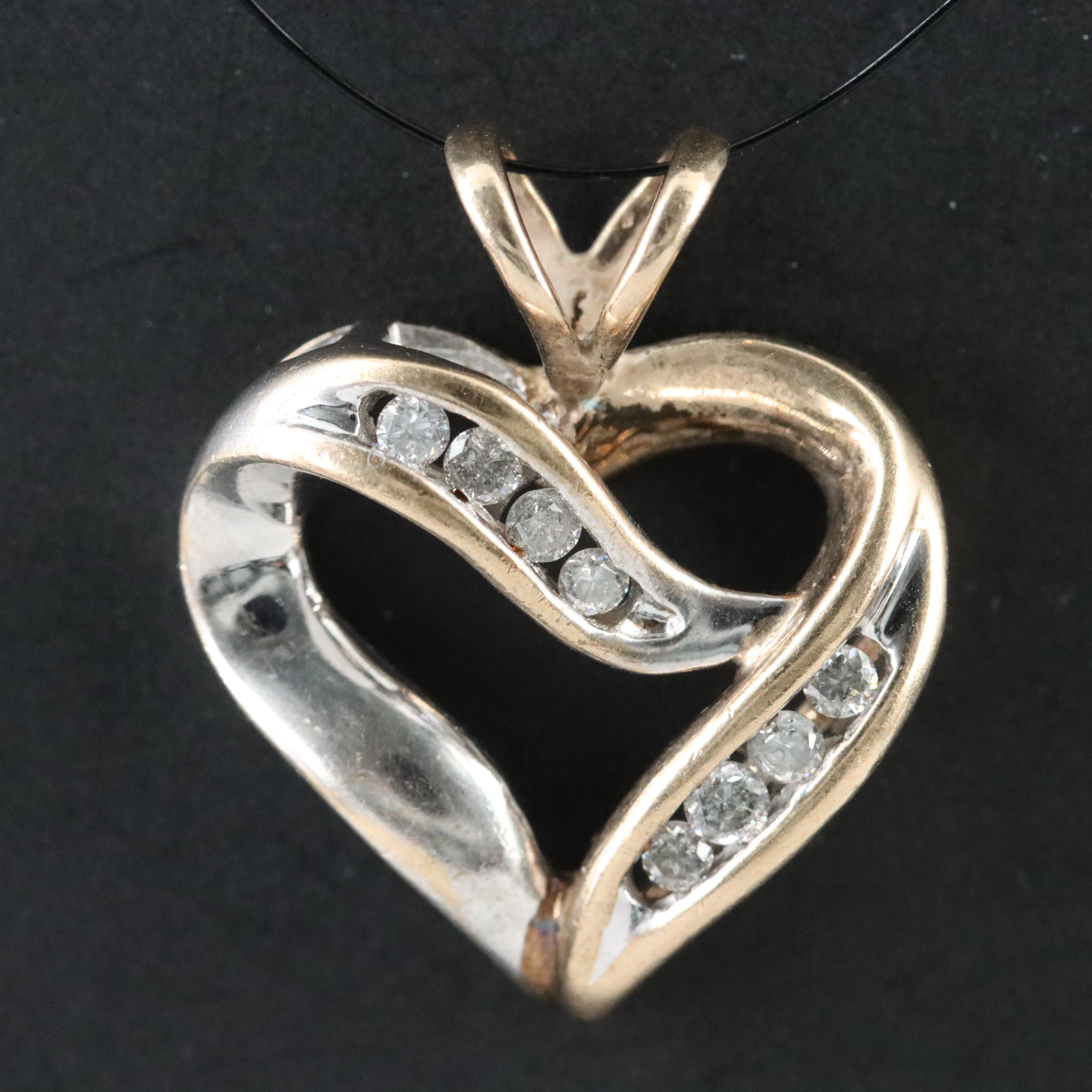 10K 0.12 CTW Diamond Heart Pendant