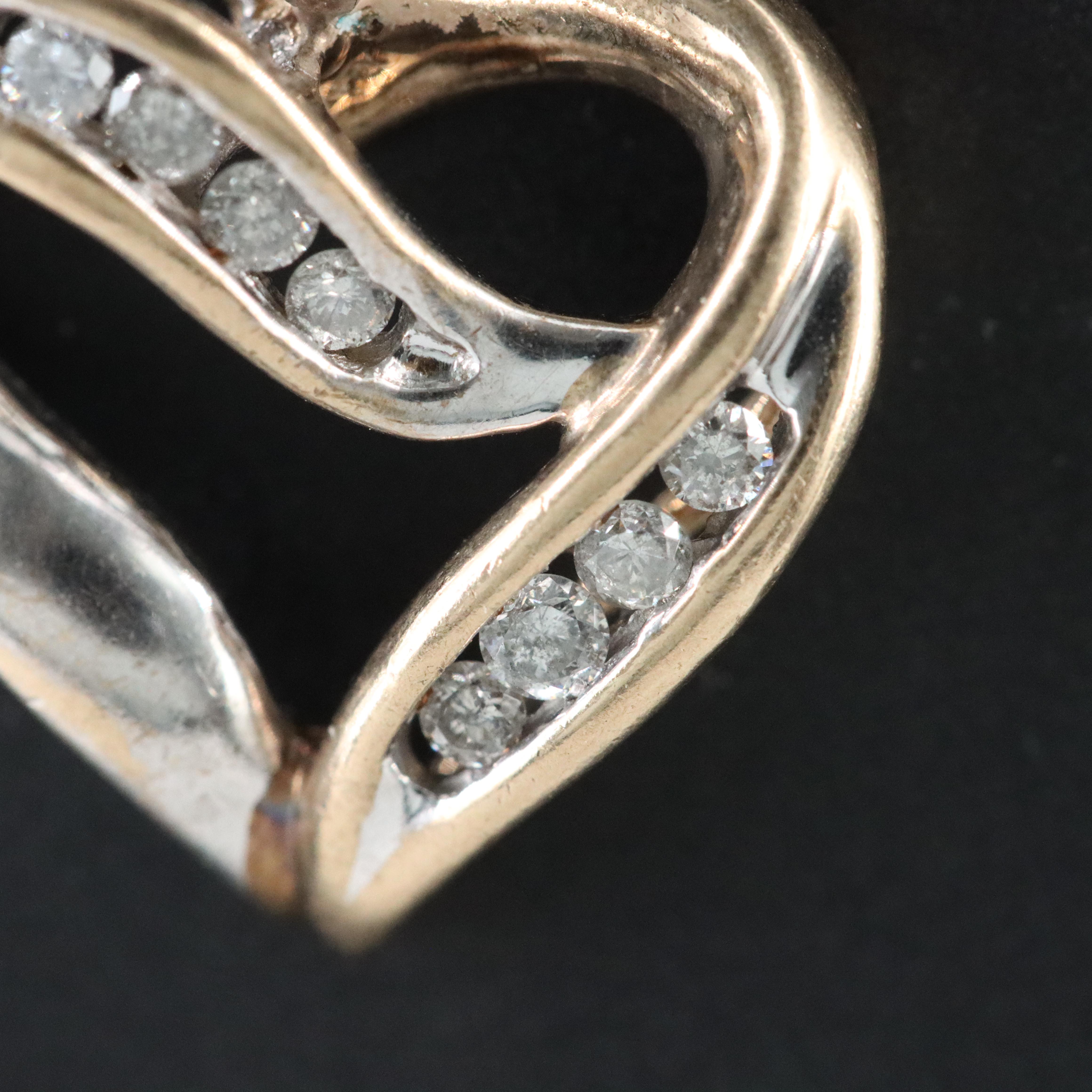 10K 0.12 CTW Diamond Heart Pendant