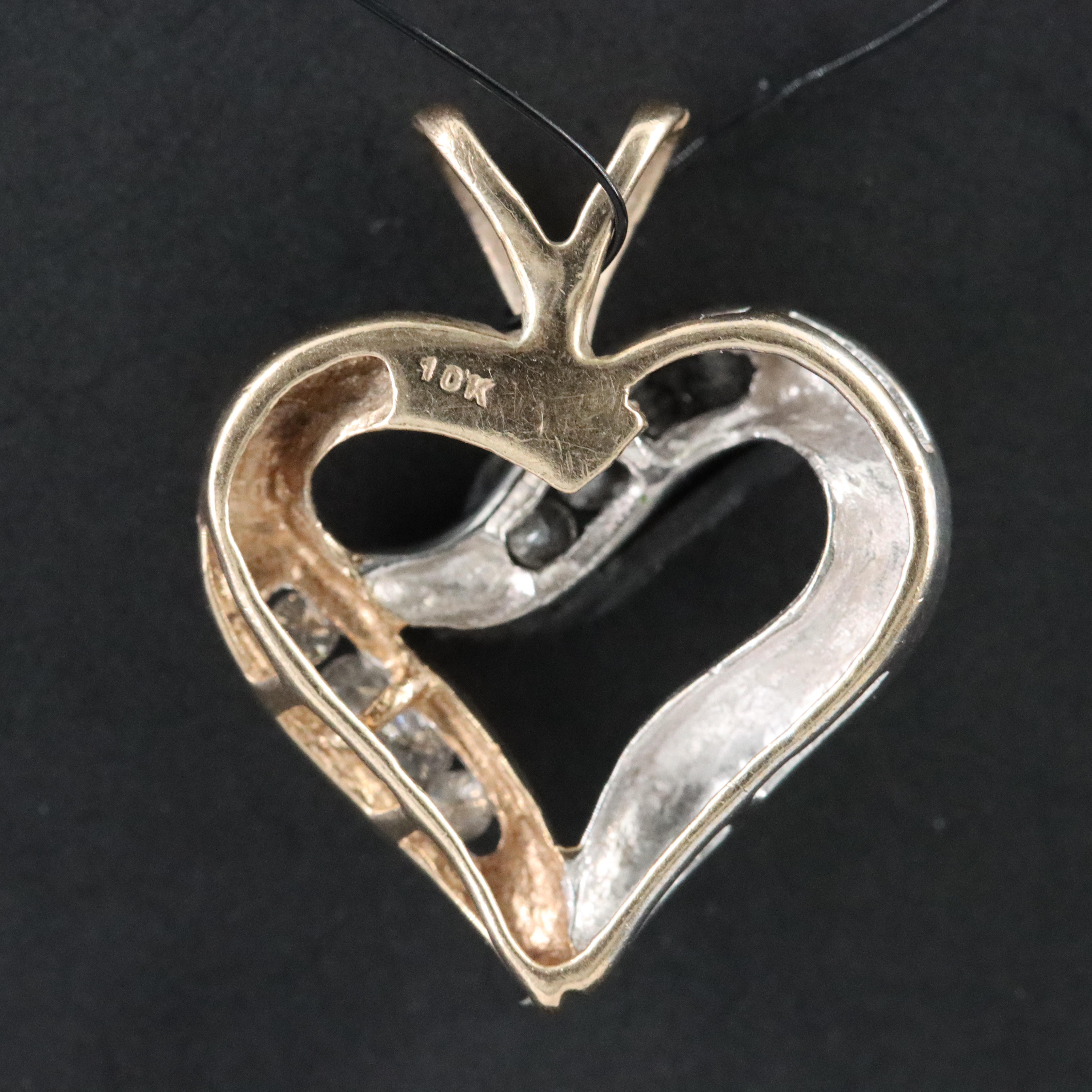 10K 0.12 CTW Diamond Heart Pendant