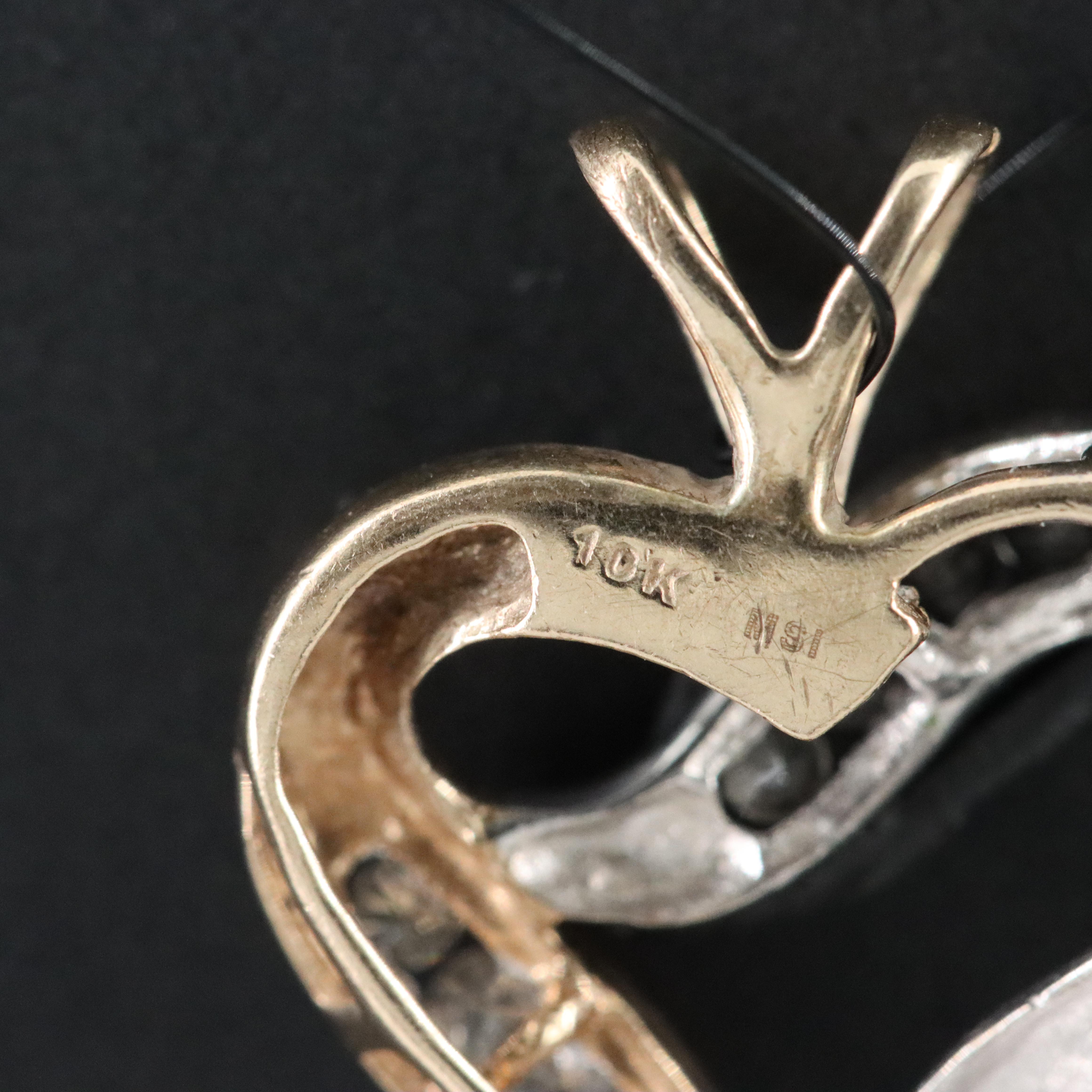 10K 0.12 CTW Diamond Heart Pendant