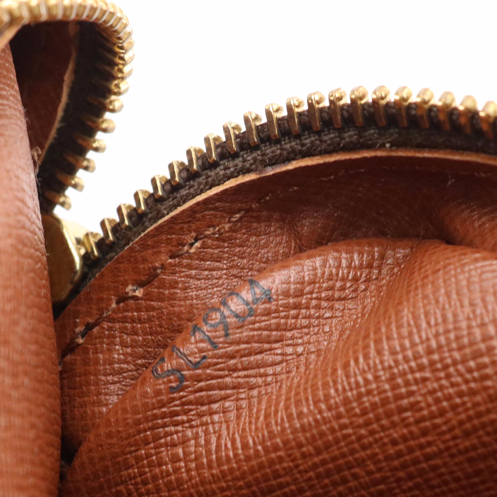 Louis Vuitton Marly Dragonne Wristlet Clutch in Monogram Canvas