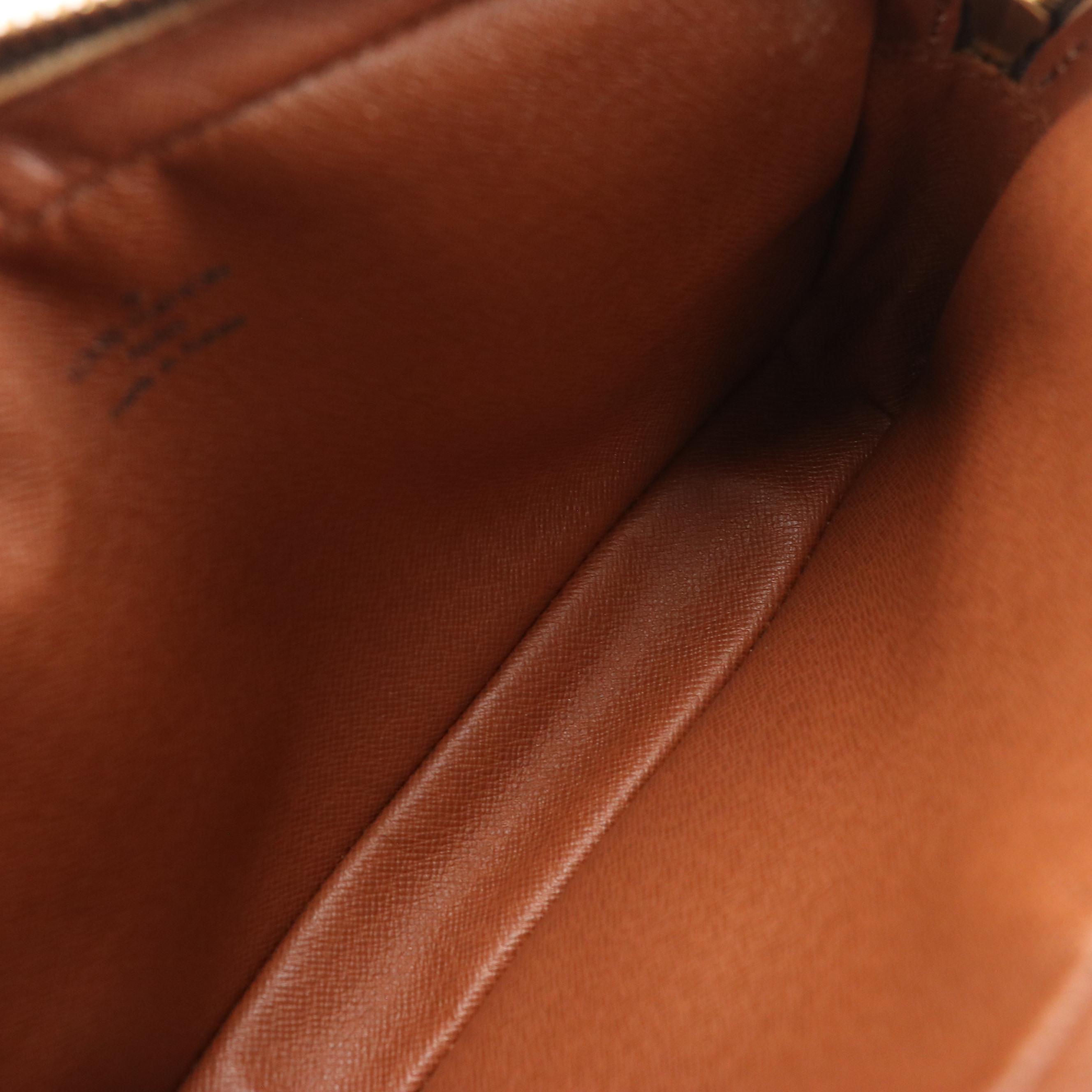 Louis Vuitton Marly Dragonne Wristlet Clutch in Monogram Canvas