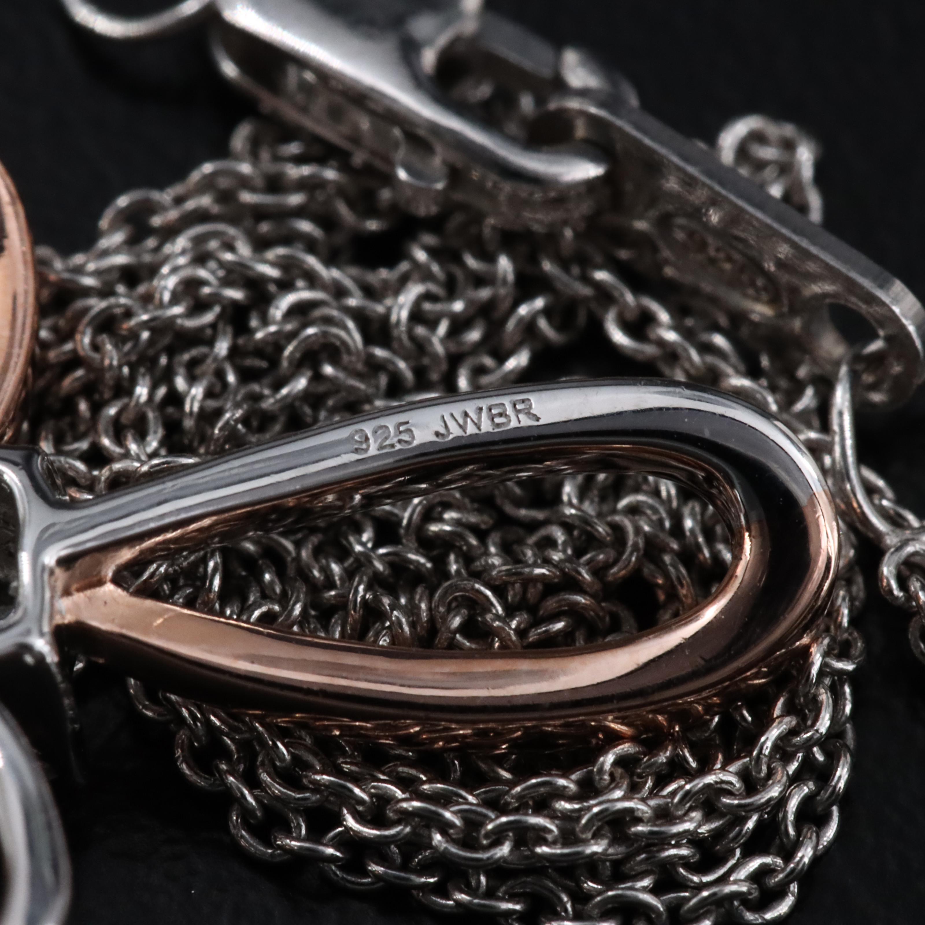 Sterling and Diamond Cross Pendant Necklace with Rose Tone Accent