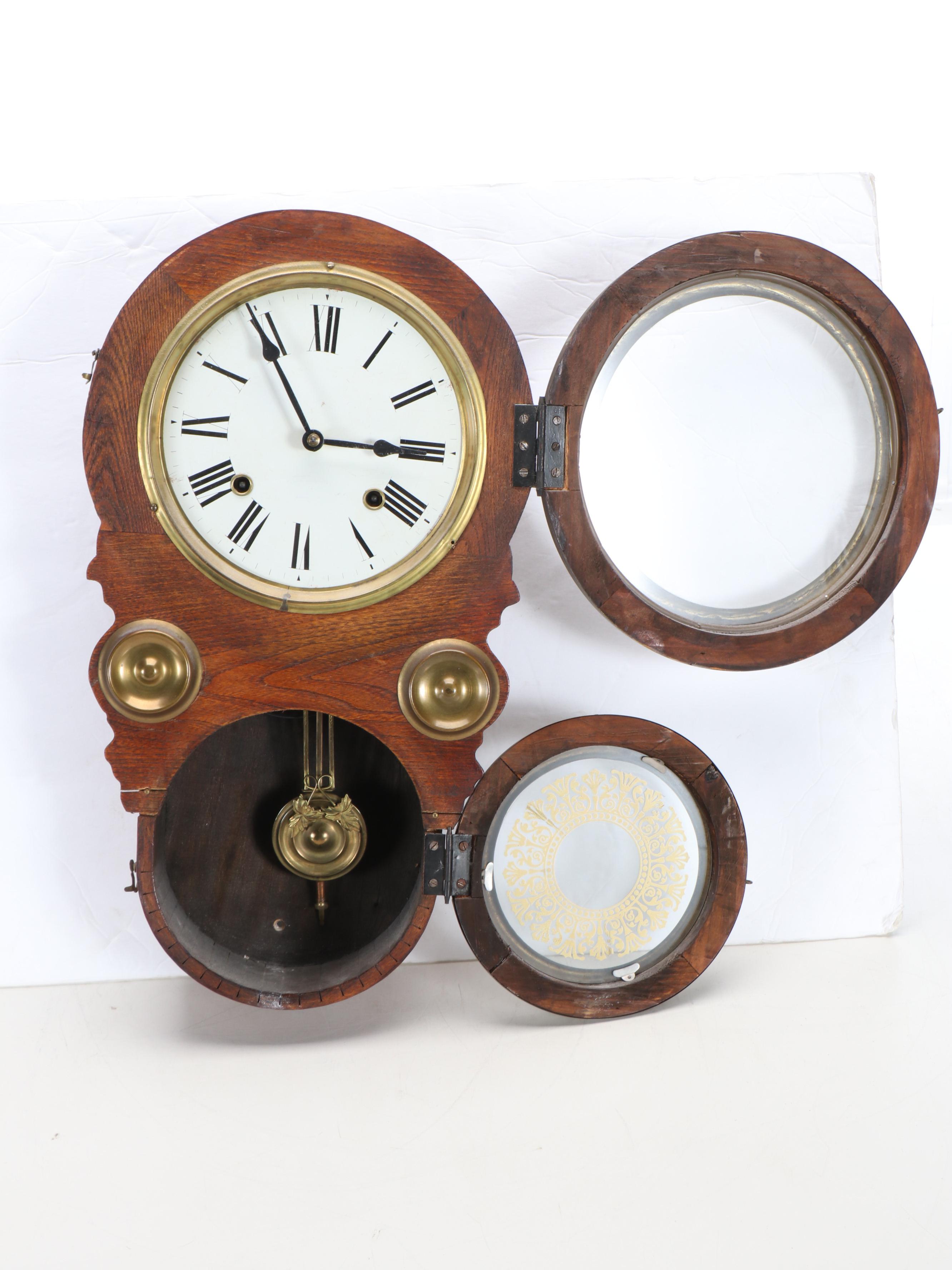 Figure-Eight Brass and Wooden Wall Clock