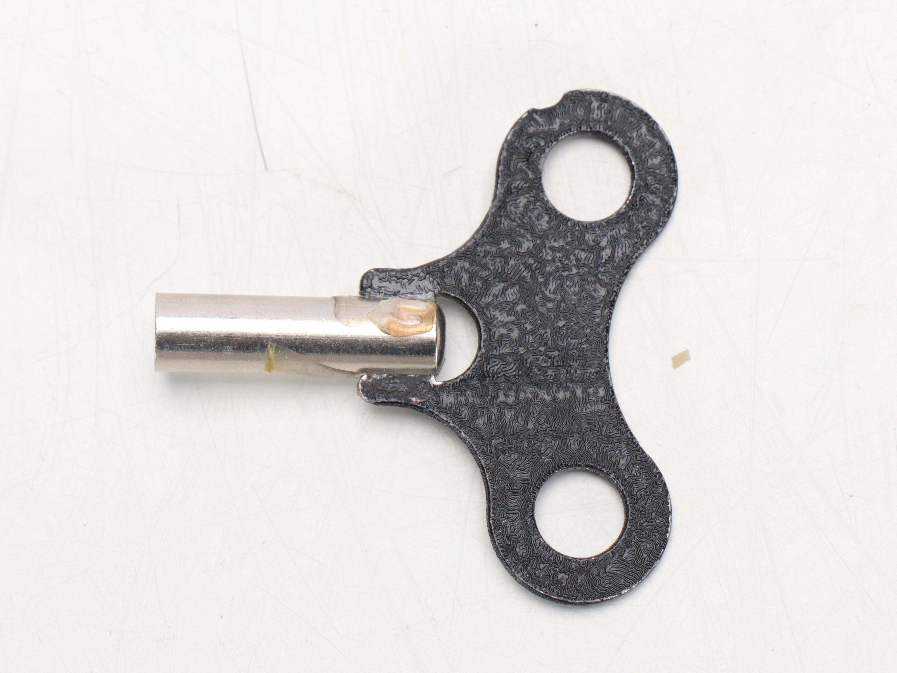 Figure-Eight Brass and Wooden Wall Clock