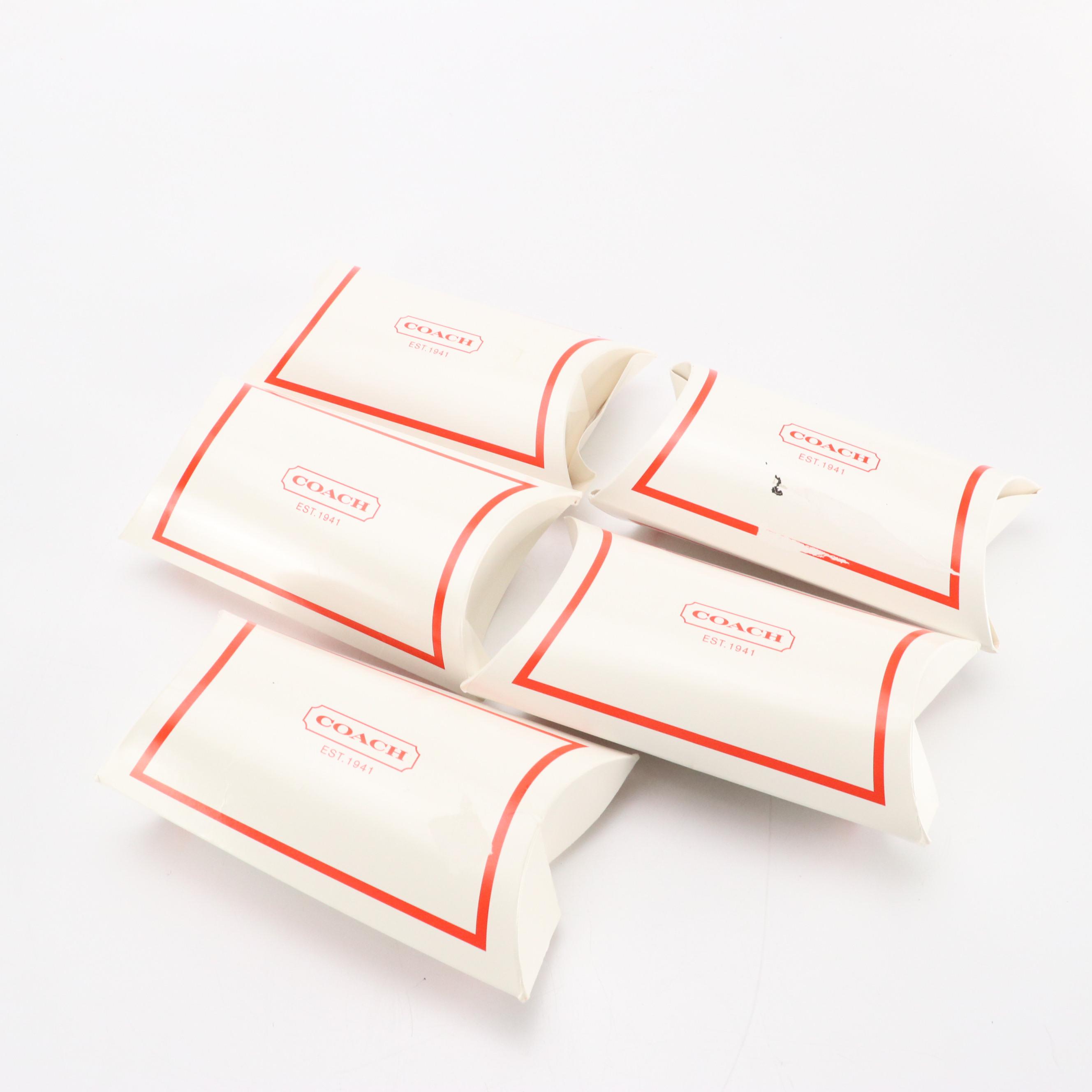 Coach Baseball & Football Shaped Leather Paperweights with Canvas Lipstick Case