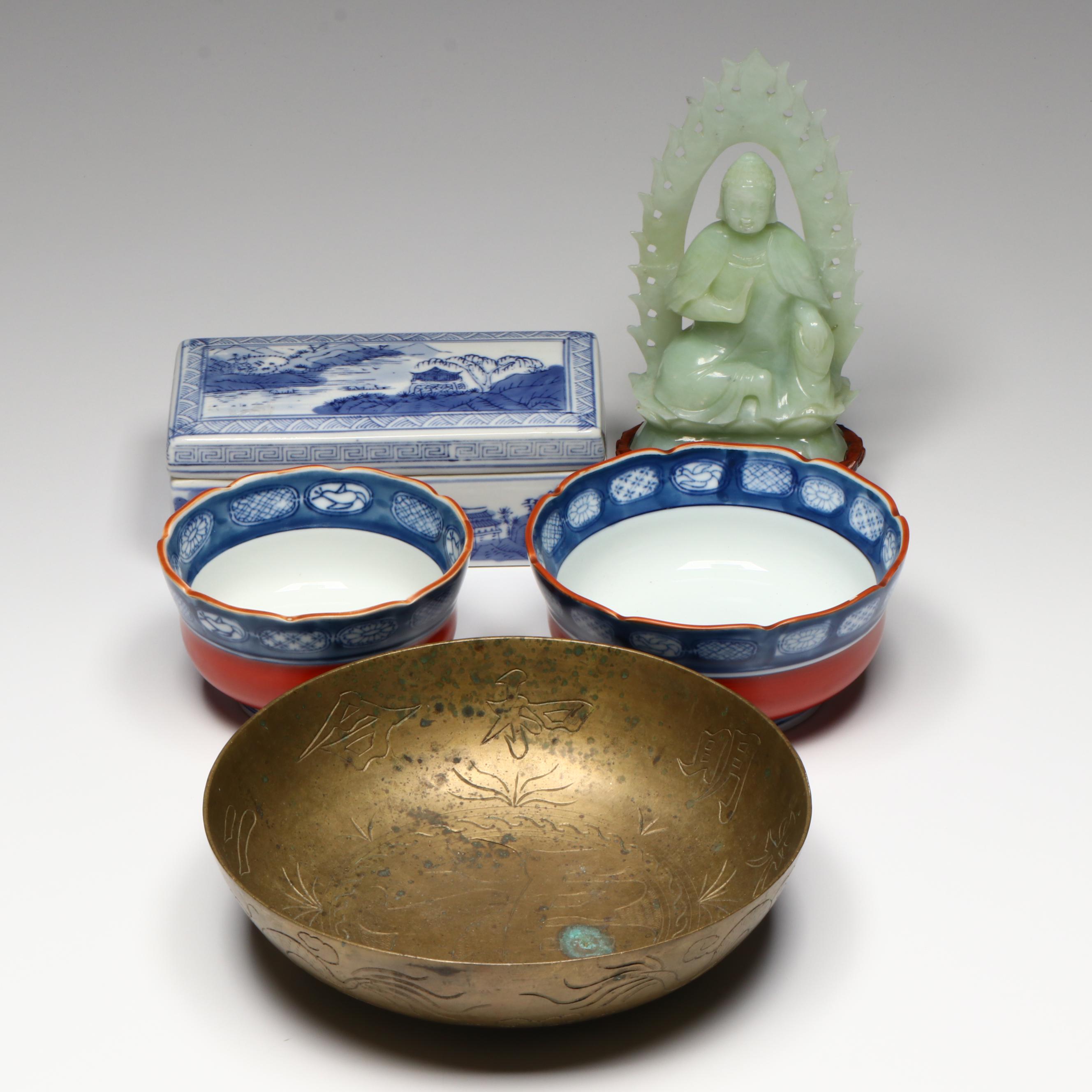 Chinese Carved Serpentine Buddha with Porcelain and Brass Collection