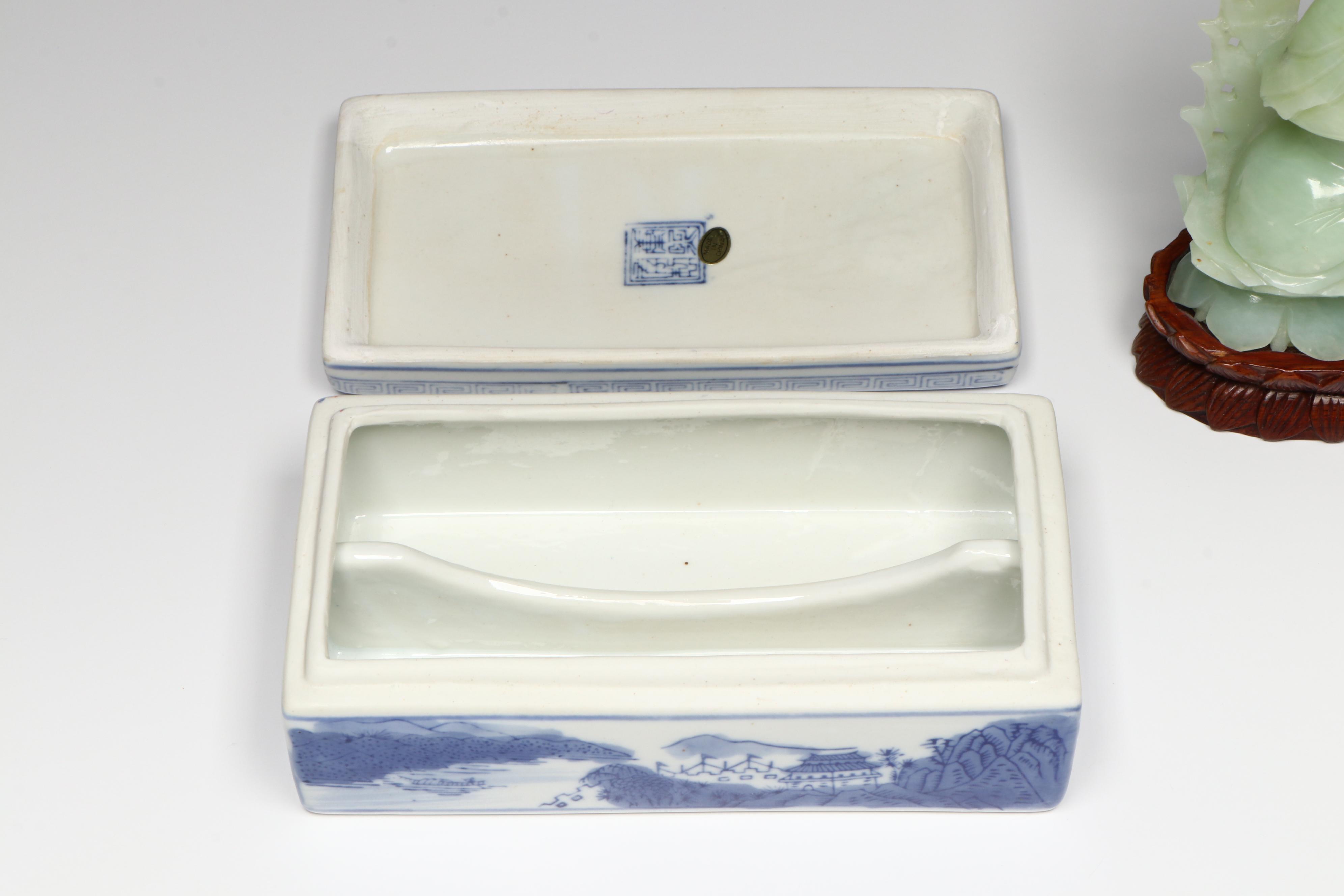 Chinese Carved Serpentine Buddha with Porcelain and Brass Collection