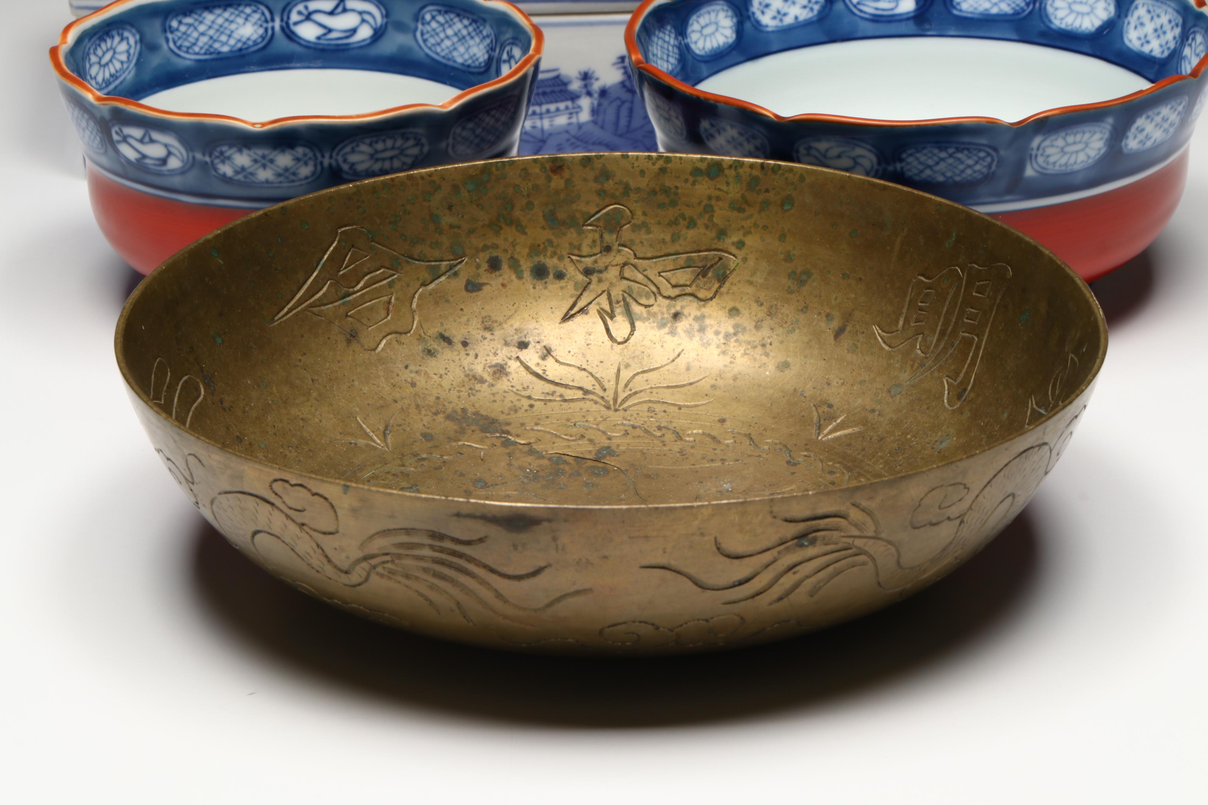 Chinese Carved Serpentine Buddha with Porcelain and Brass Collection