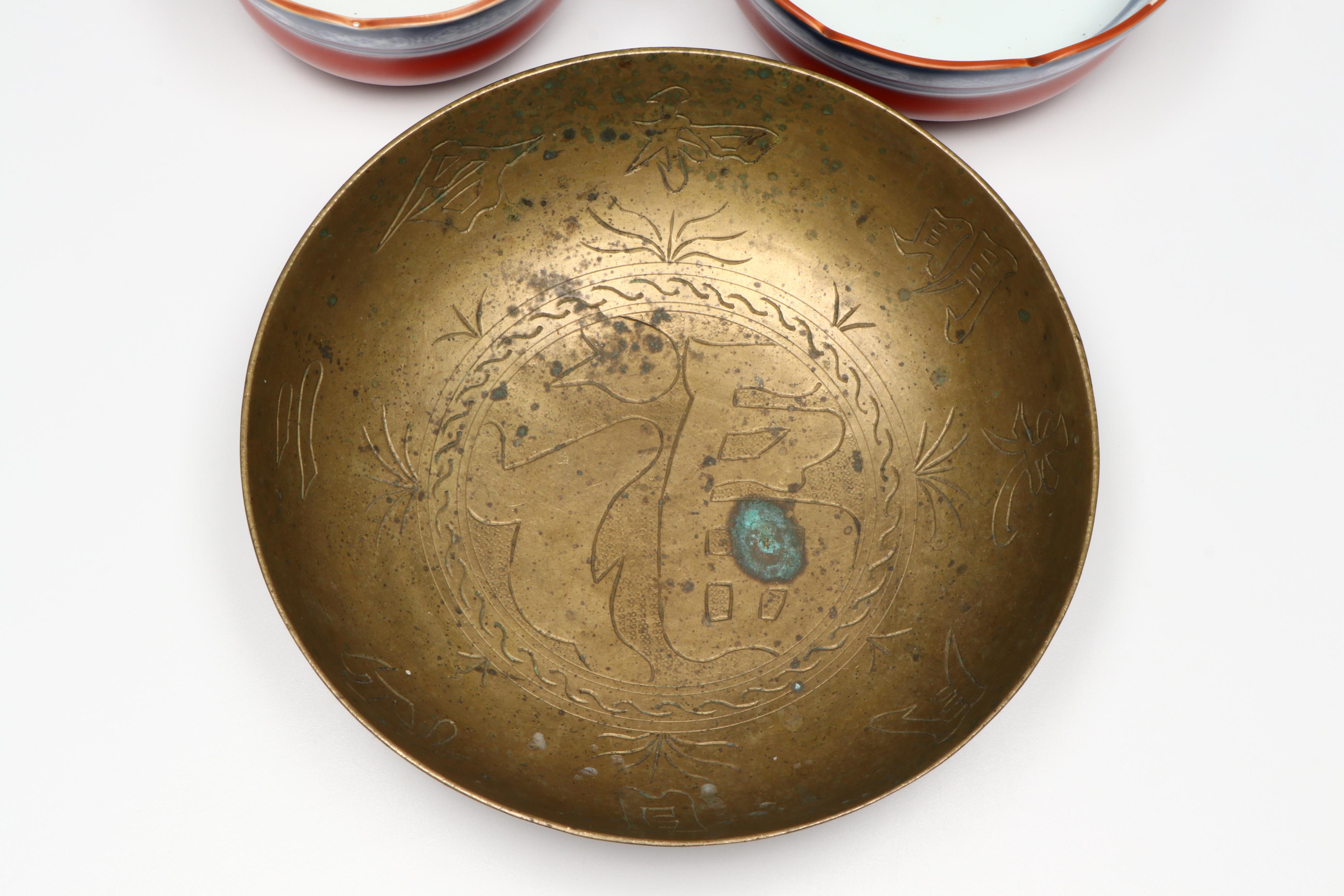 Chinese Carved Serpentine Buddha with Porcelain and Brass Collection