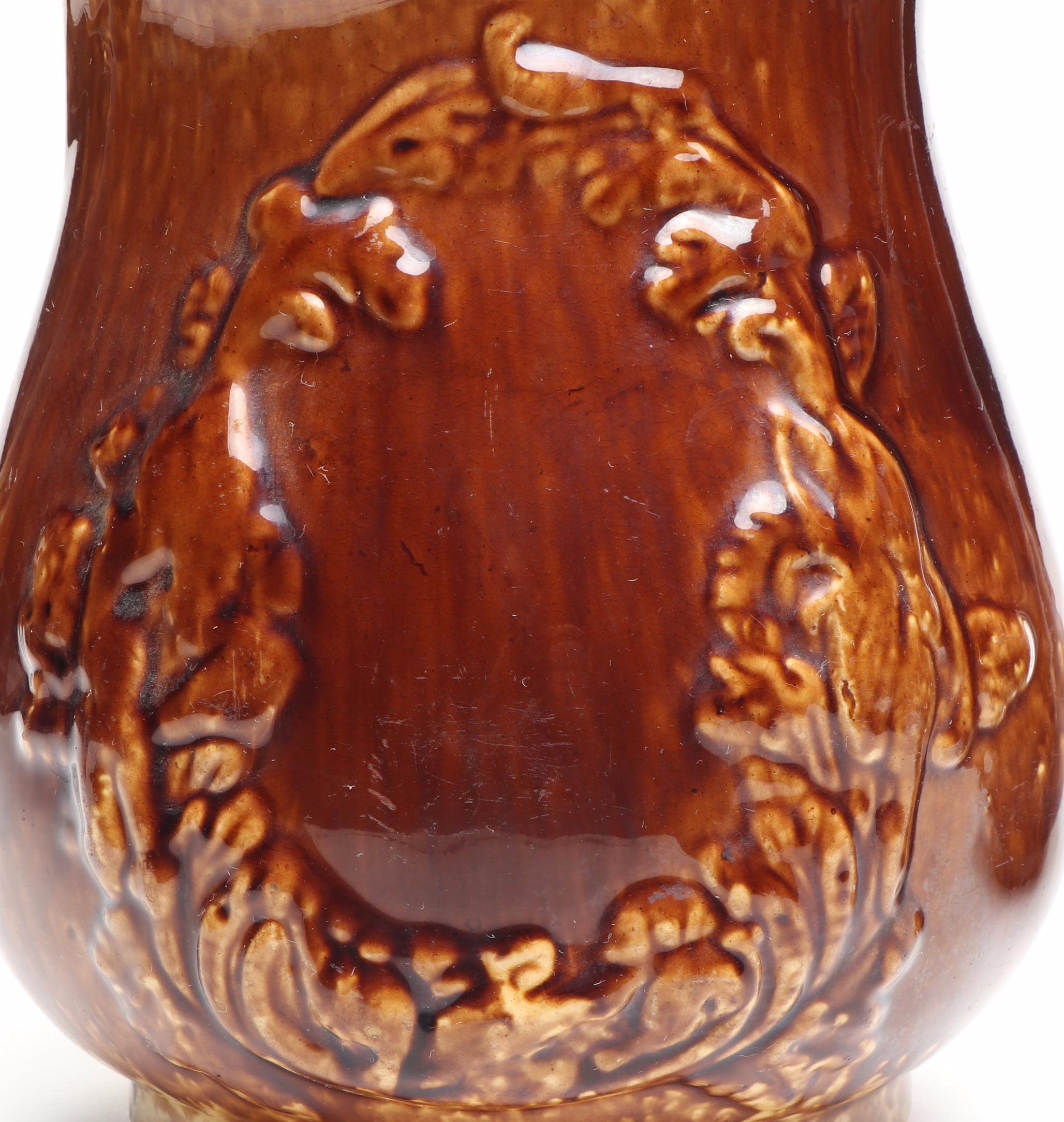 Bennington Rockingham Glazed Molded Earthenware Pitchers