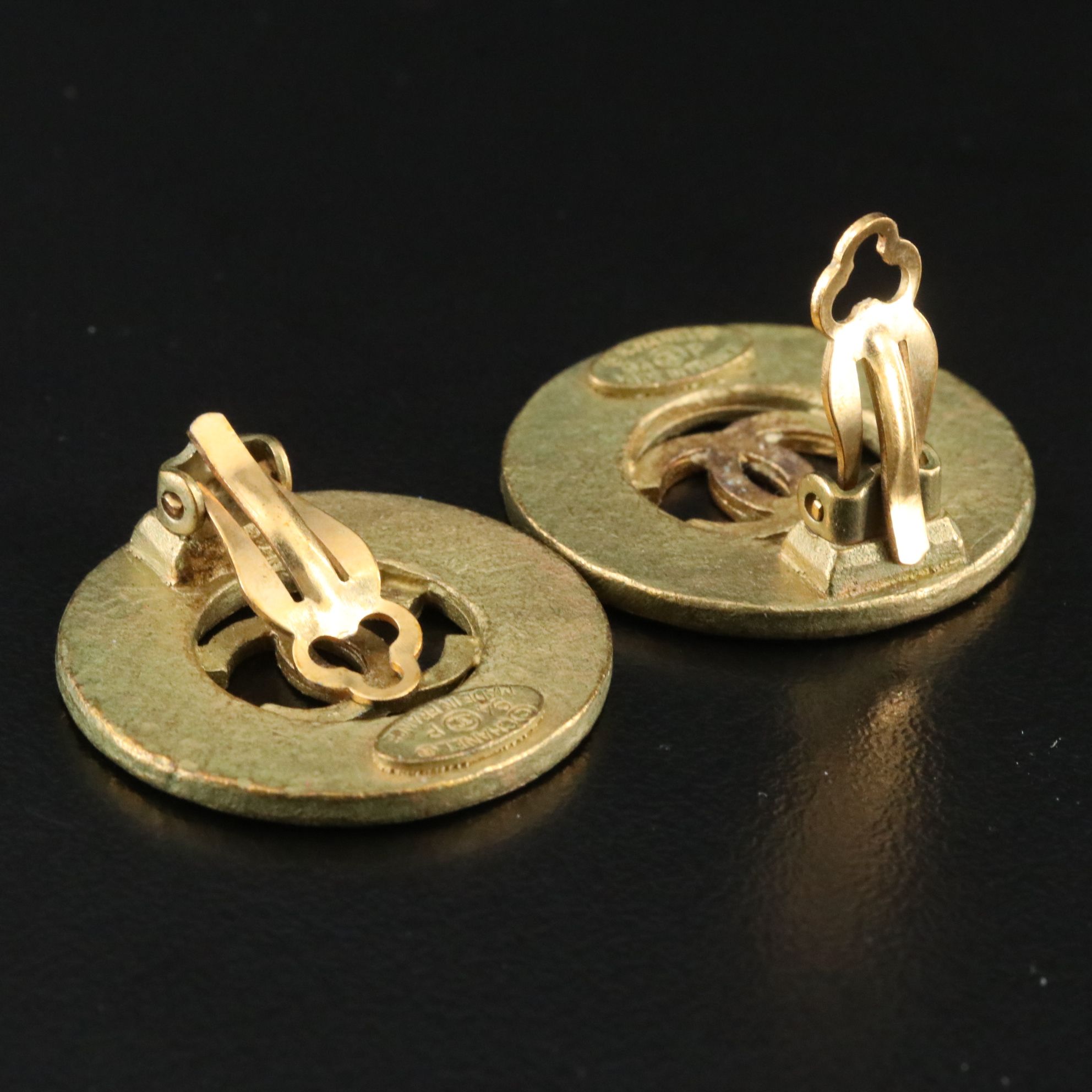 Chanel CC Logo Cutout Round Clip Earrings
