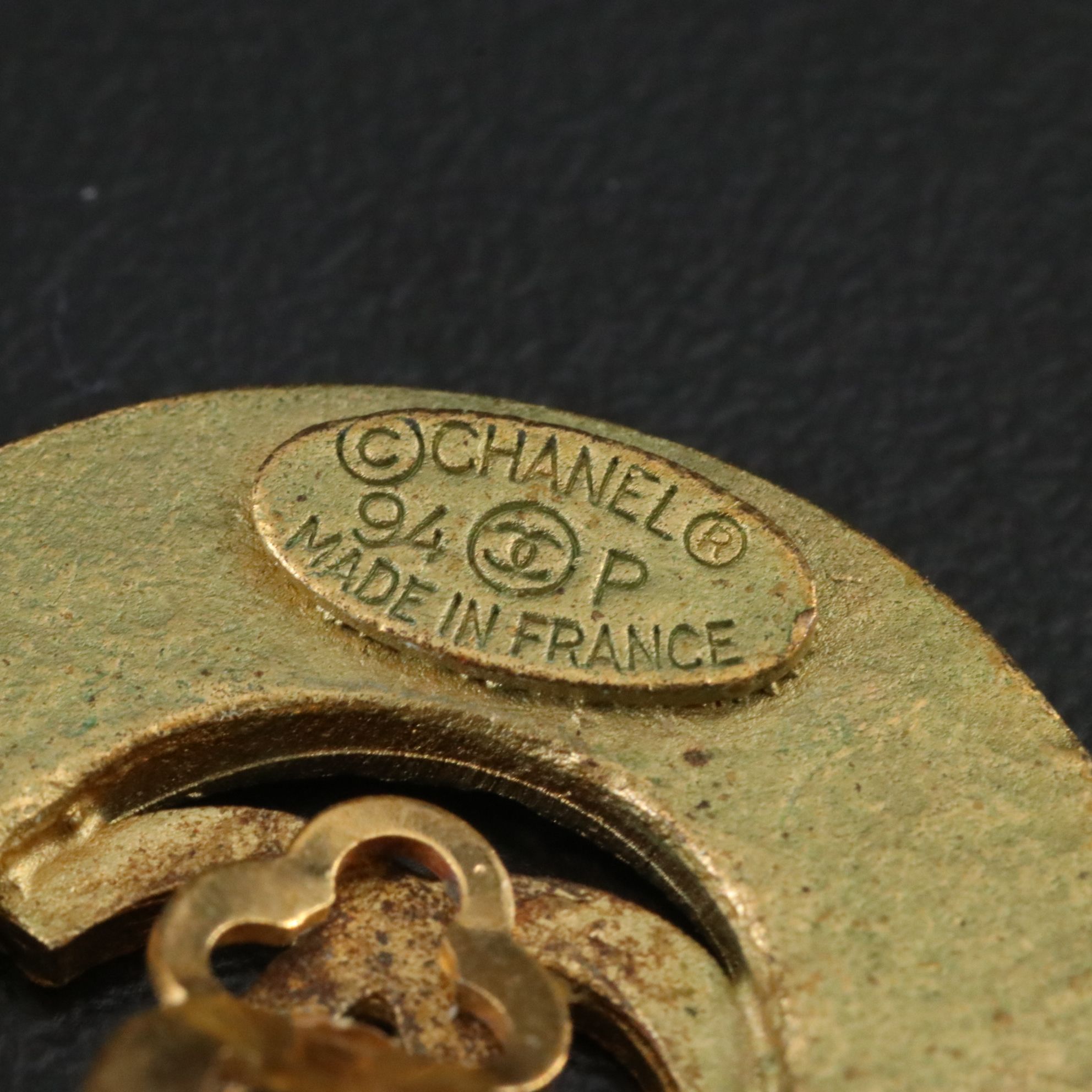 Chanel CC Logo Cutout Round Clip Earrings