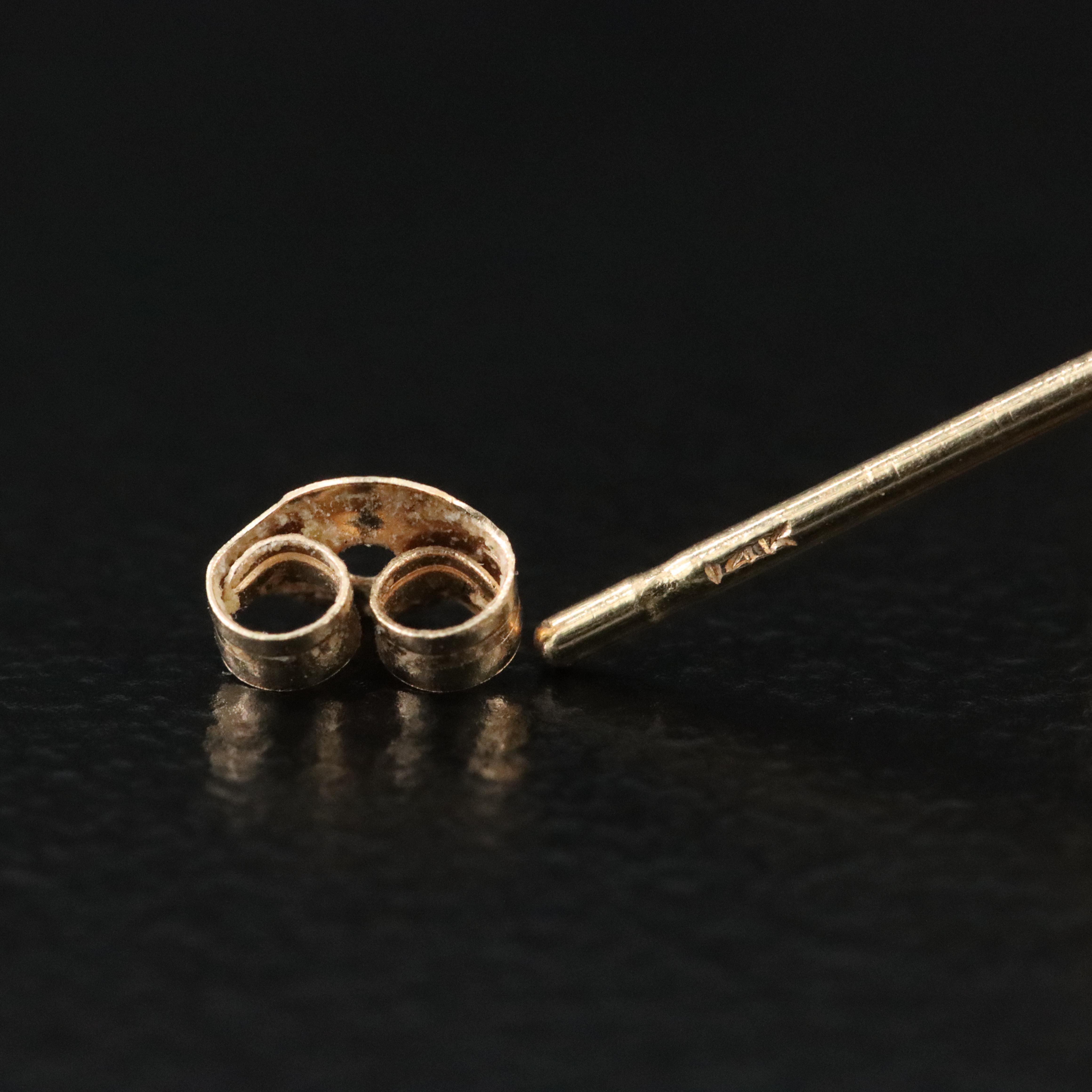 14K 0.10 CTW Diamond Leaf Earrings