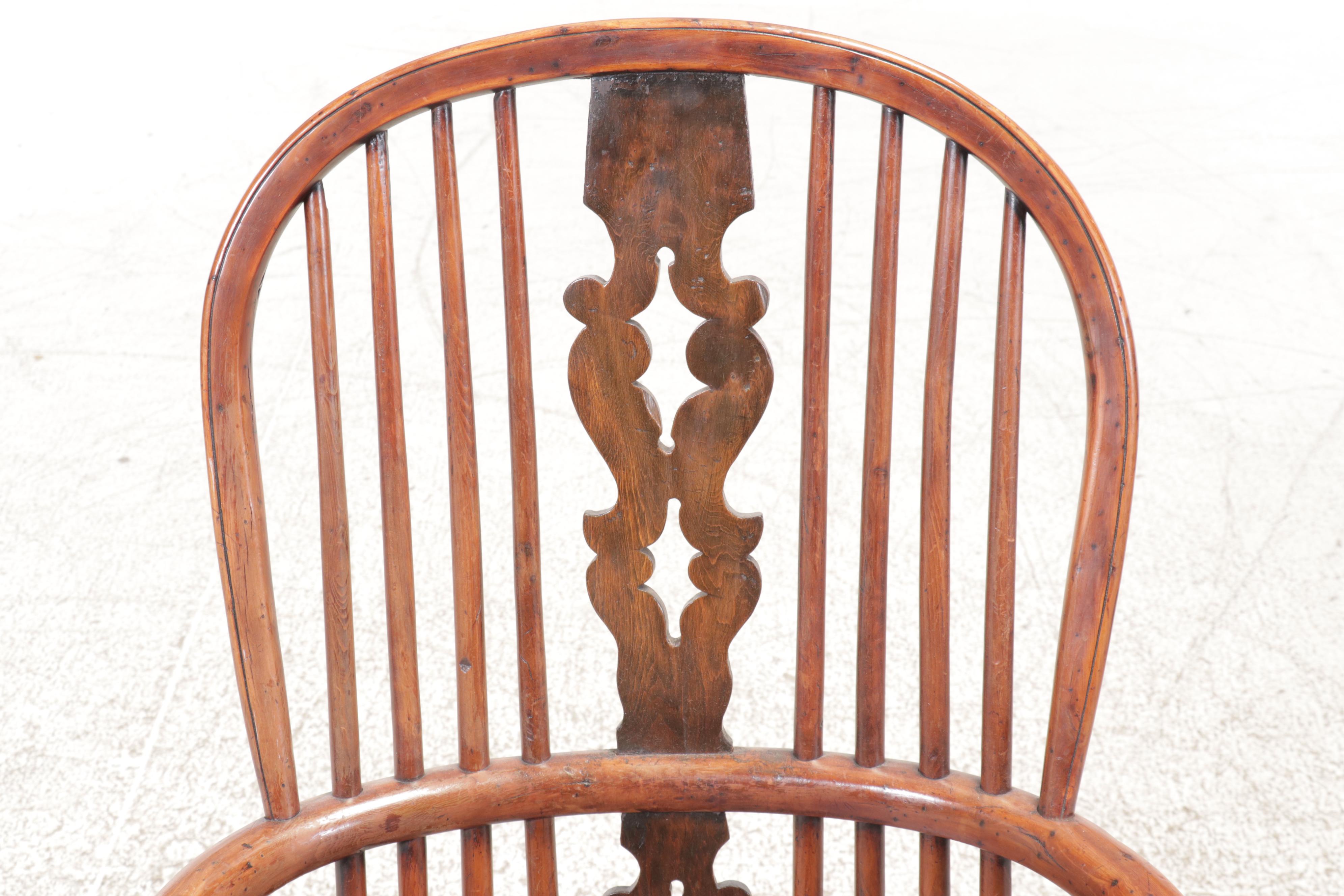 Three Oak Sack-Back Windsor Armchairs