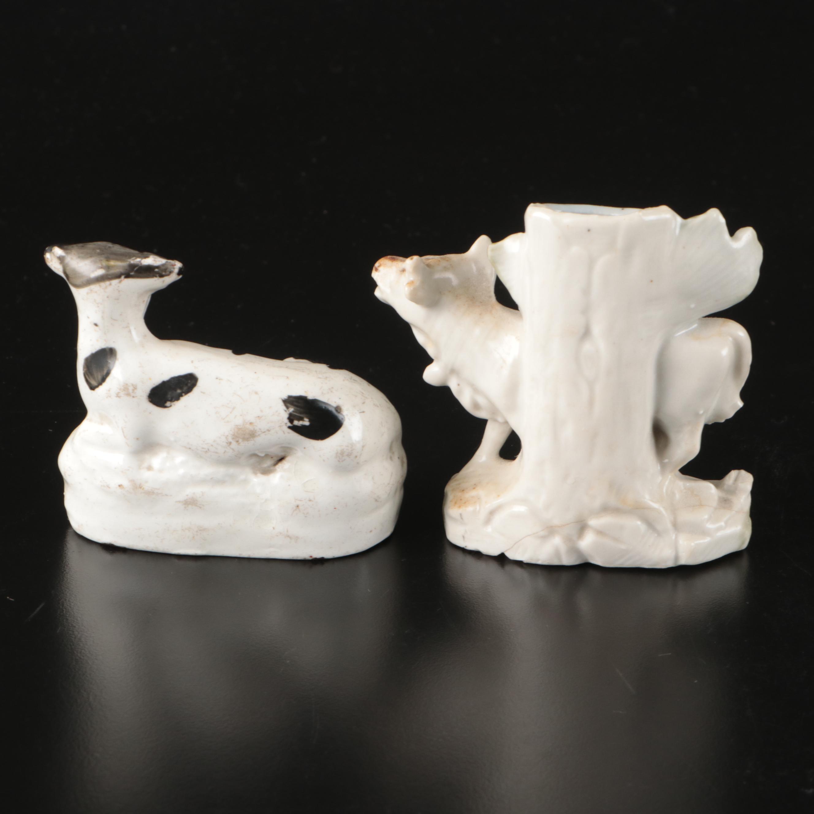 Staffordshire Reclining Greyhound with Other Figurines and Candle Holder