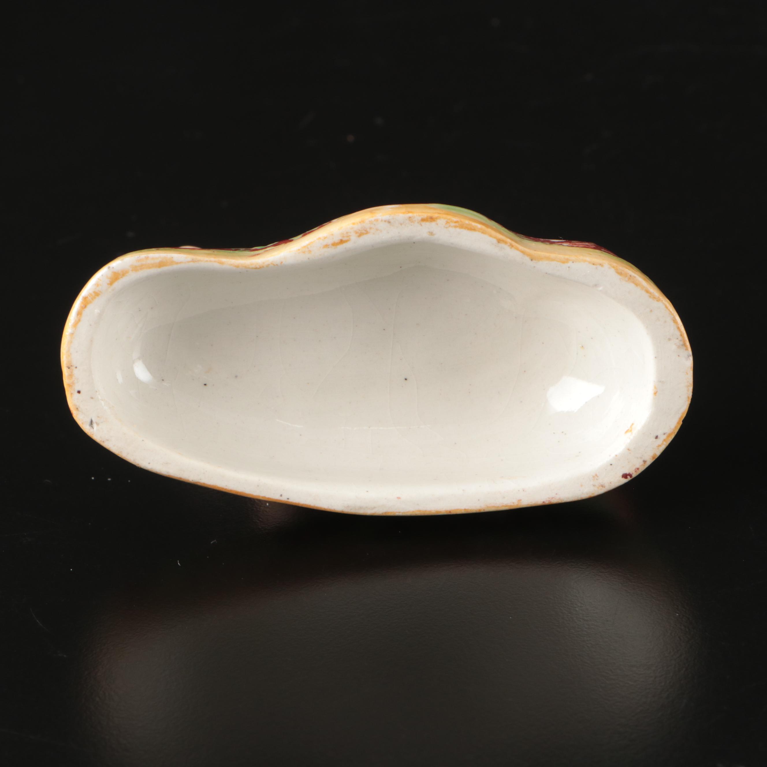 Staffordshire Reclining Greyhound with Other Figurines and Candle Holder