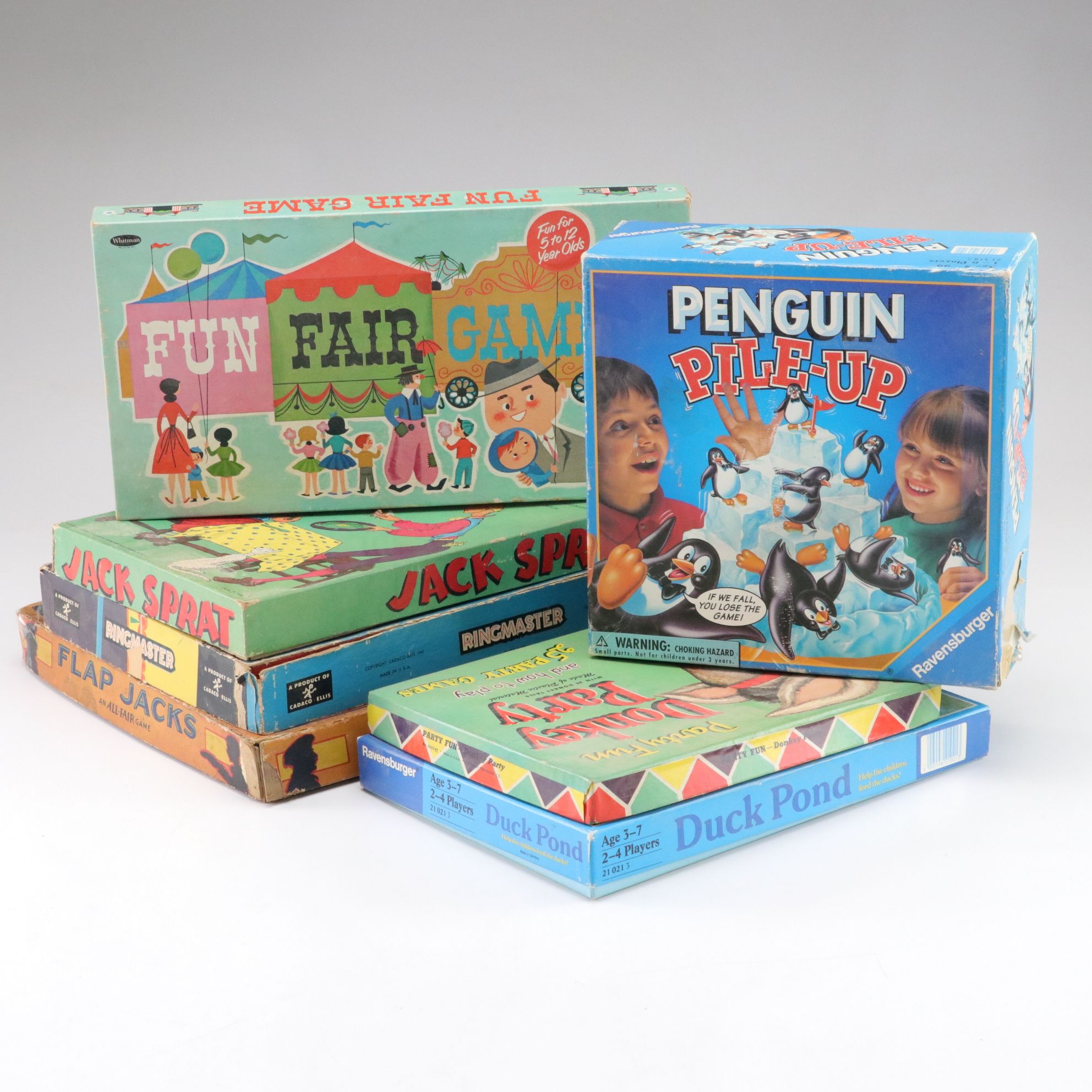 "Flap Jacks" and "Penguin Pile-Up" in Set of Carnival and Other Board Games