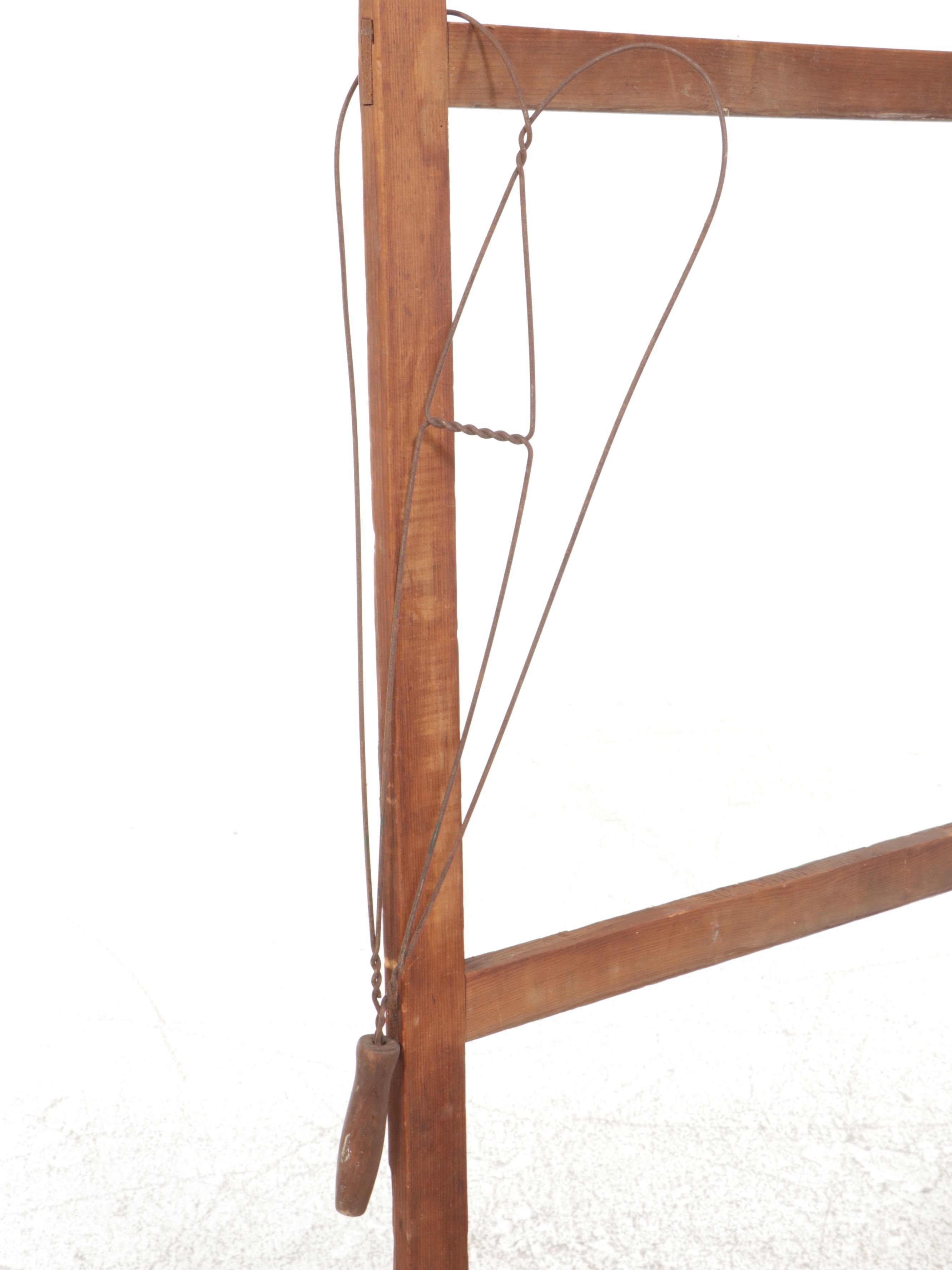 Primitive Rug Beater and Drying Rack with Hand-Embroidered Pink Crib Quilt