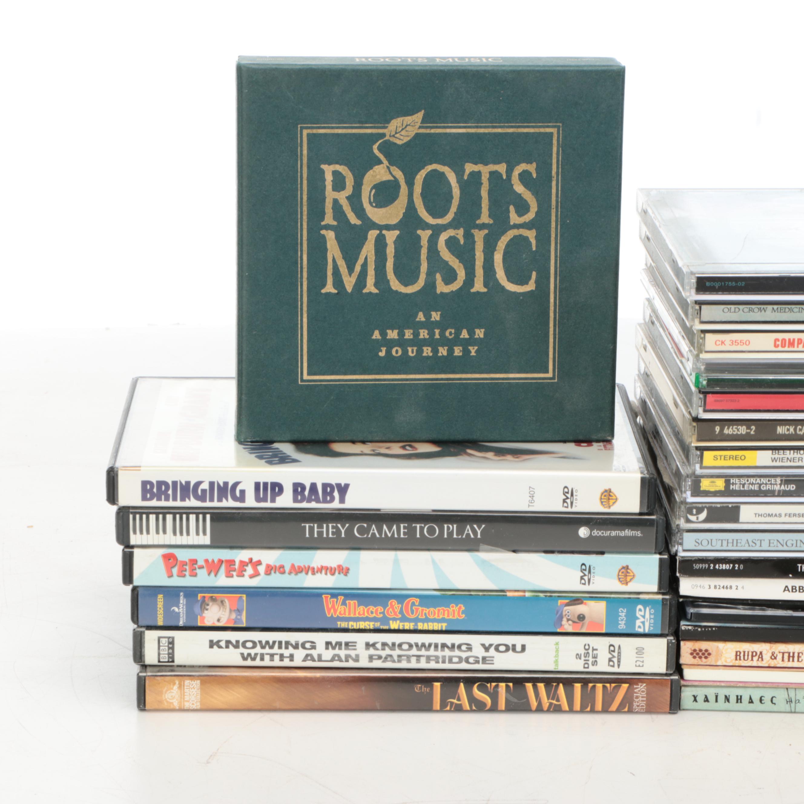 Jensen CD Player and AM/FM Radio with CD and DVD Collection