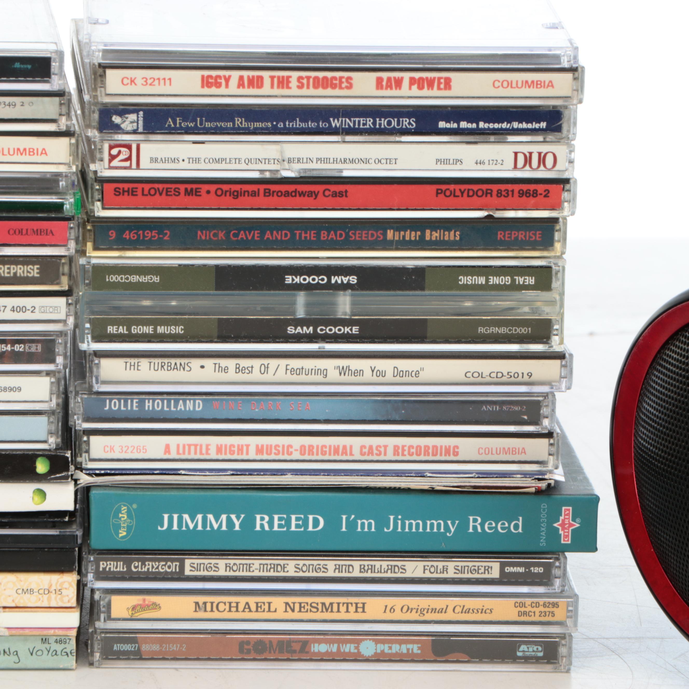 Jensen CD Player and AM/FM Radio with CD and DVD Collection