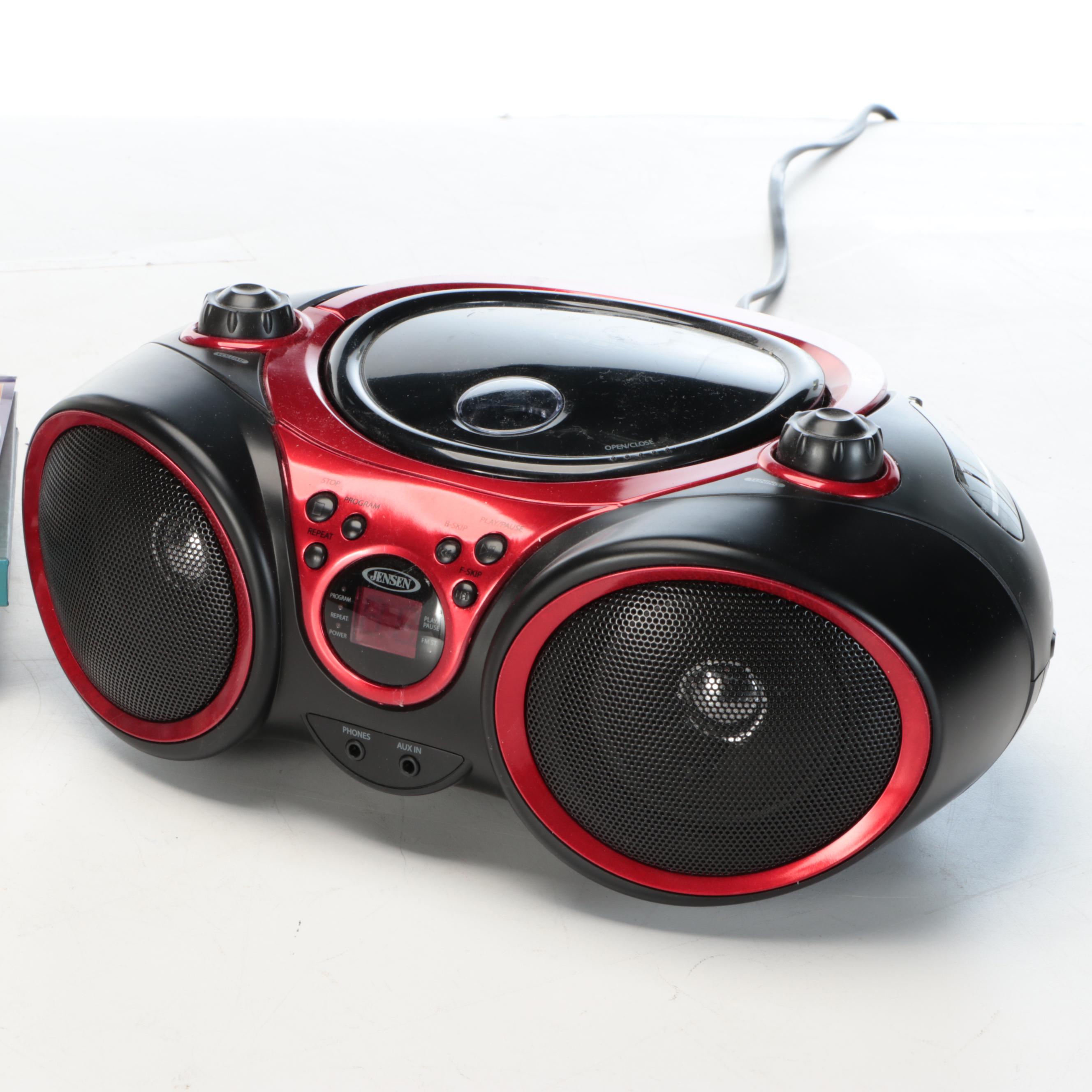 Jensen CD Player and AM/FM Radio with CD and DVD Collection