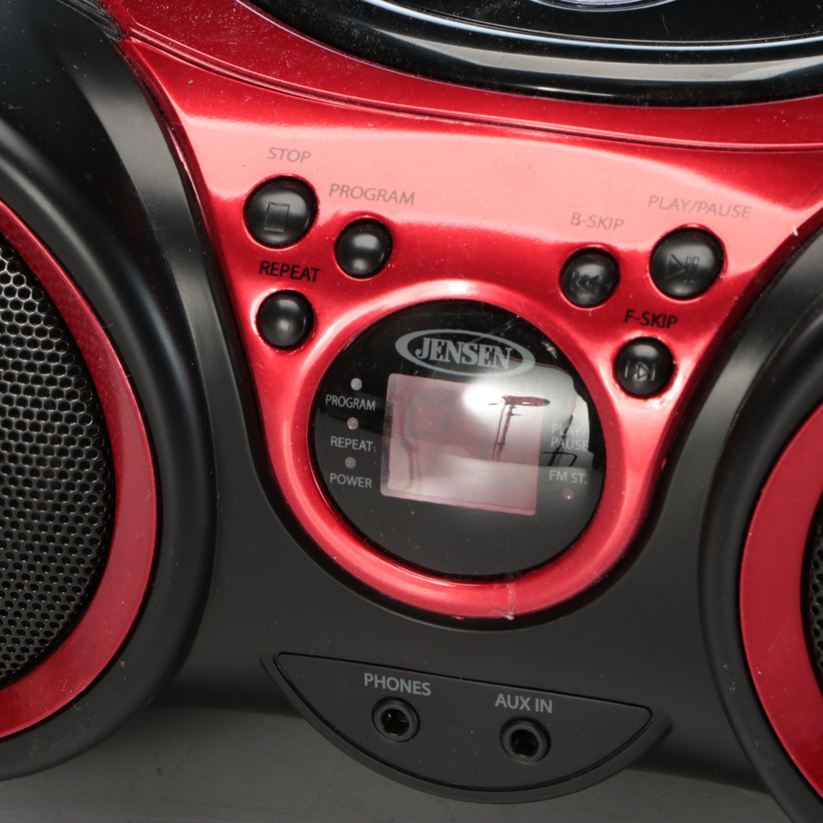 Jensen CD Player and AM/FM Radio with CD and DVD Collection