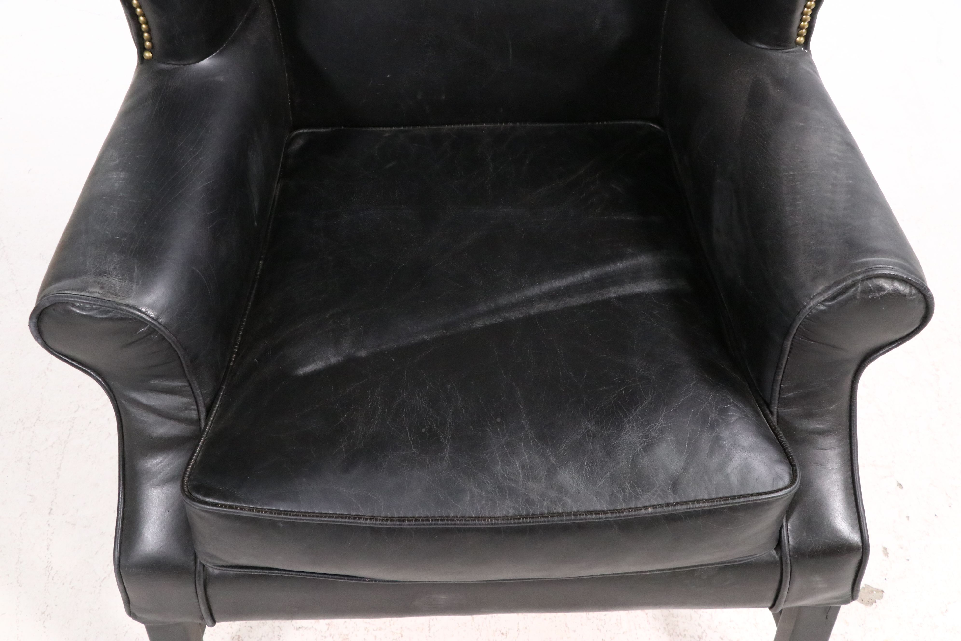 Contemporary Black Leather Wingback Armchair with Nailhead Trim