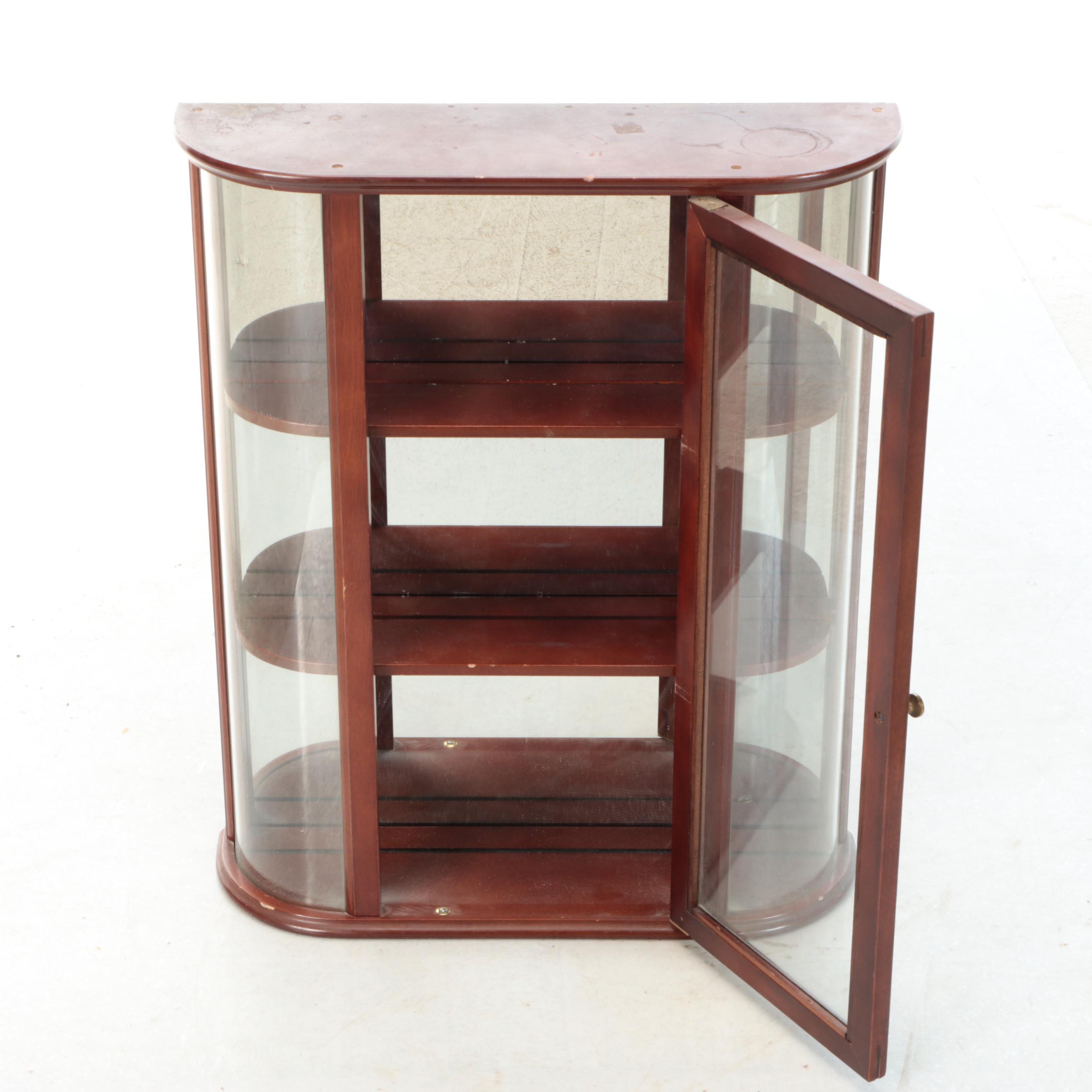 The Bombay Co. Curved Mahogany Curio Cabinet with Mirror Back