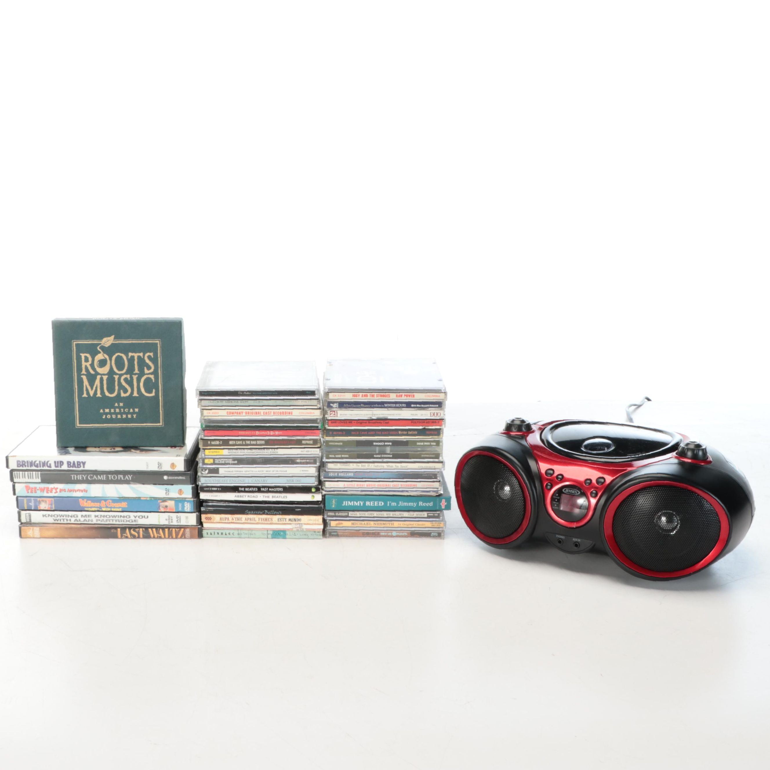 Jensen CD Player and AM/FM Radio with CD and DVD Collection