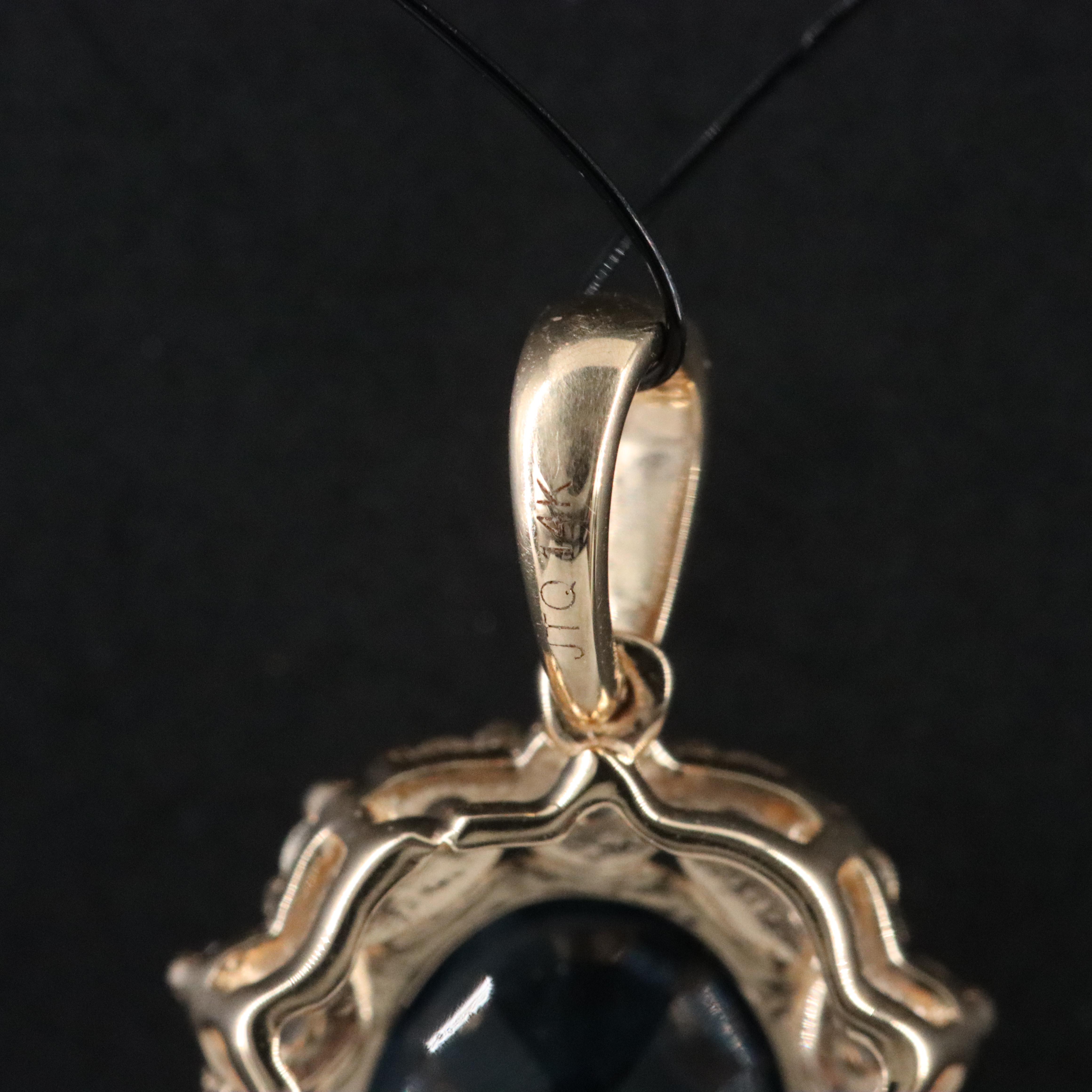 14K 2.19 CT Sapphire and White Sapphire Pendant