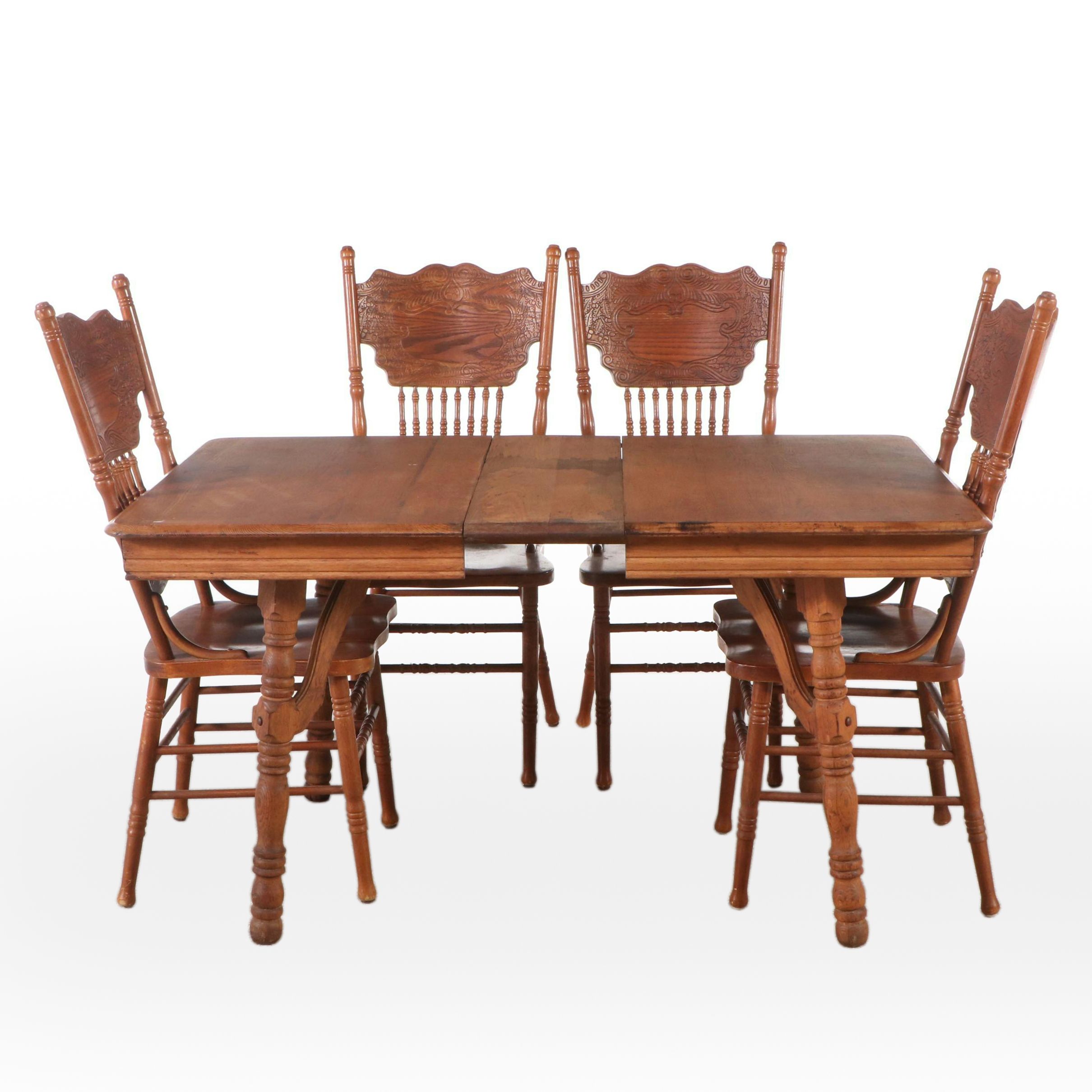 Victorian Dining Table and Four Press-Carved Oak Side Chairs