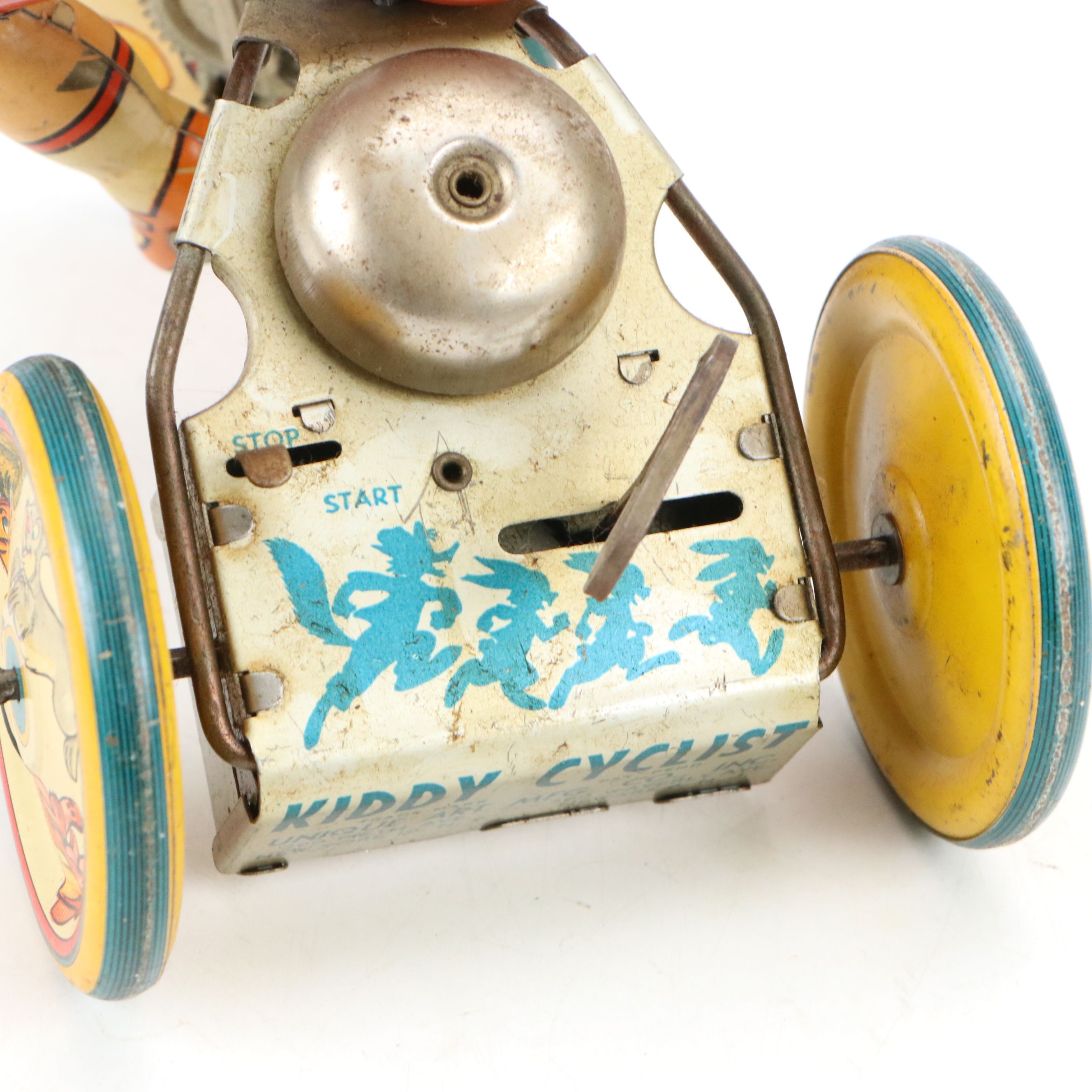 Unique Art Mfg. Co., Inc. "Kiddy Cyclist" Tin Wind-Up Toy, Mid-20th Century
