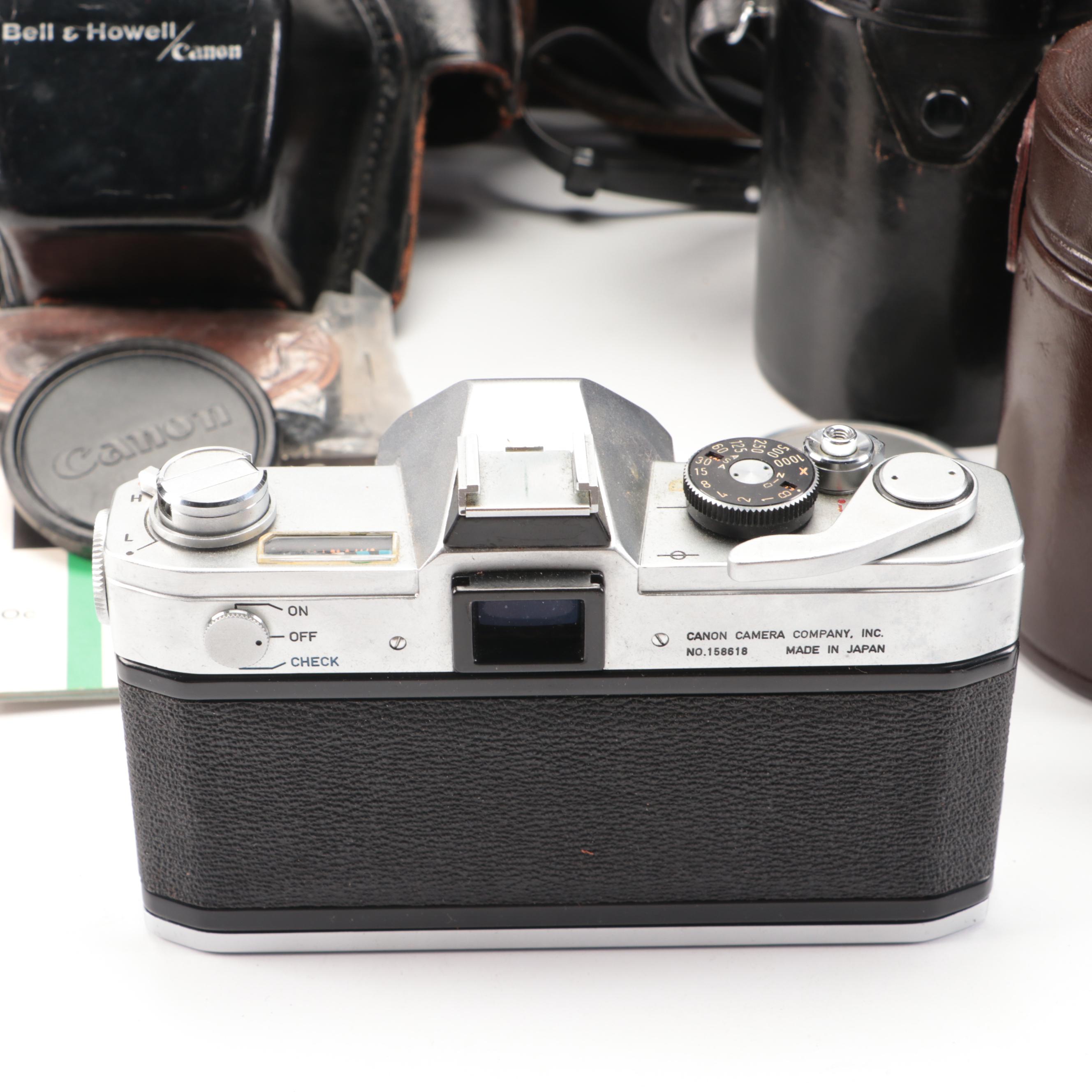 Bell & Howell / Canon FX 35mm Camera with Collection of Lenses, Leather Cases