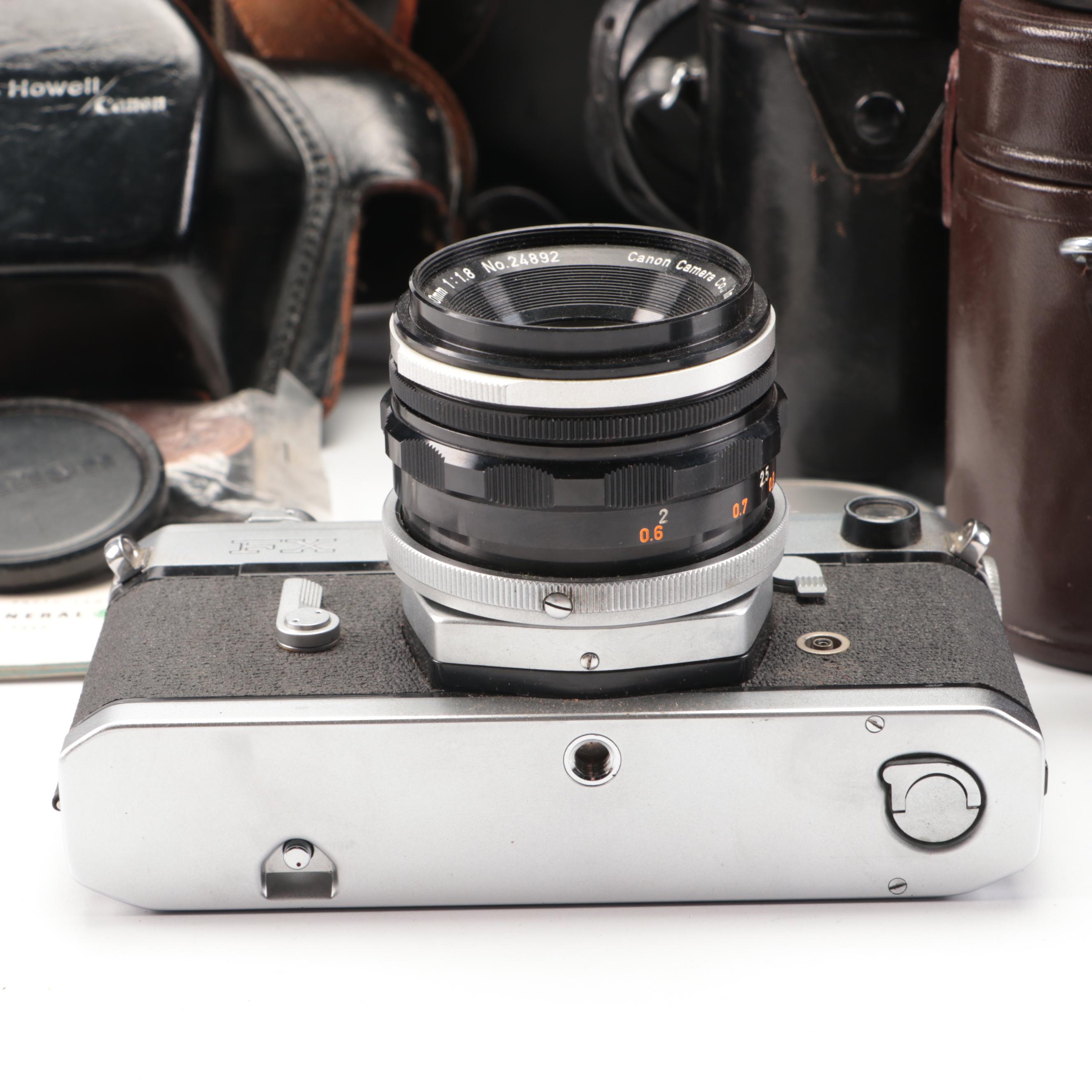 Bell & Howell / Canon FX 35mm Camera with Collection of Lenses, Leather Cases