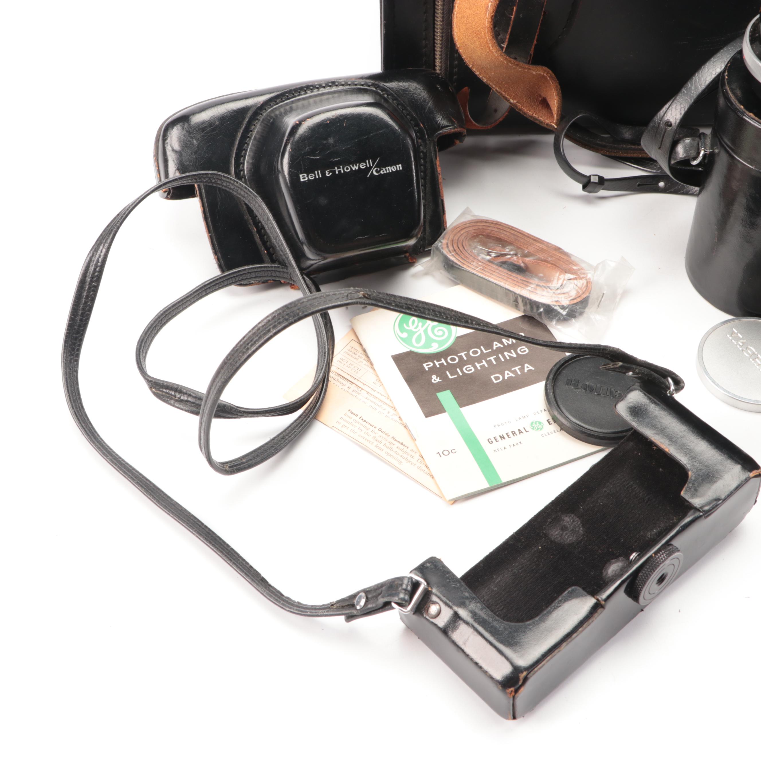 Bell & Howell / Canon FX 35mm Camera with Collection of Lenses, Leather Cases