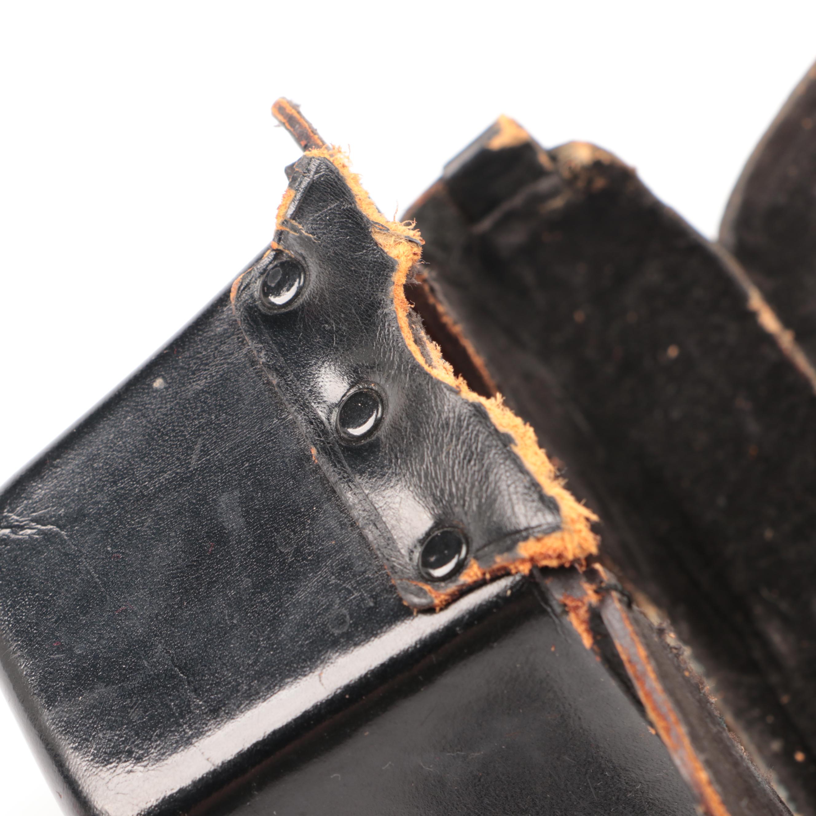 Bell & Howell / Canon FX 35mm Camera with Collection of Lenses, Leather Cases