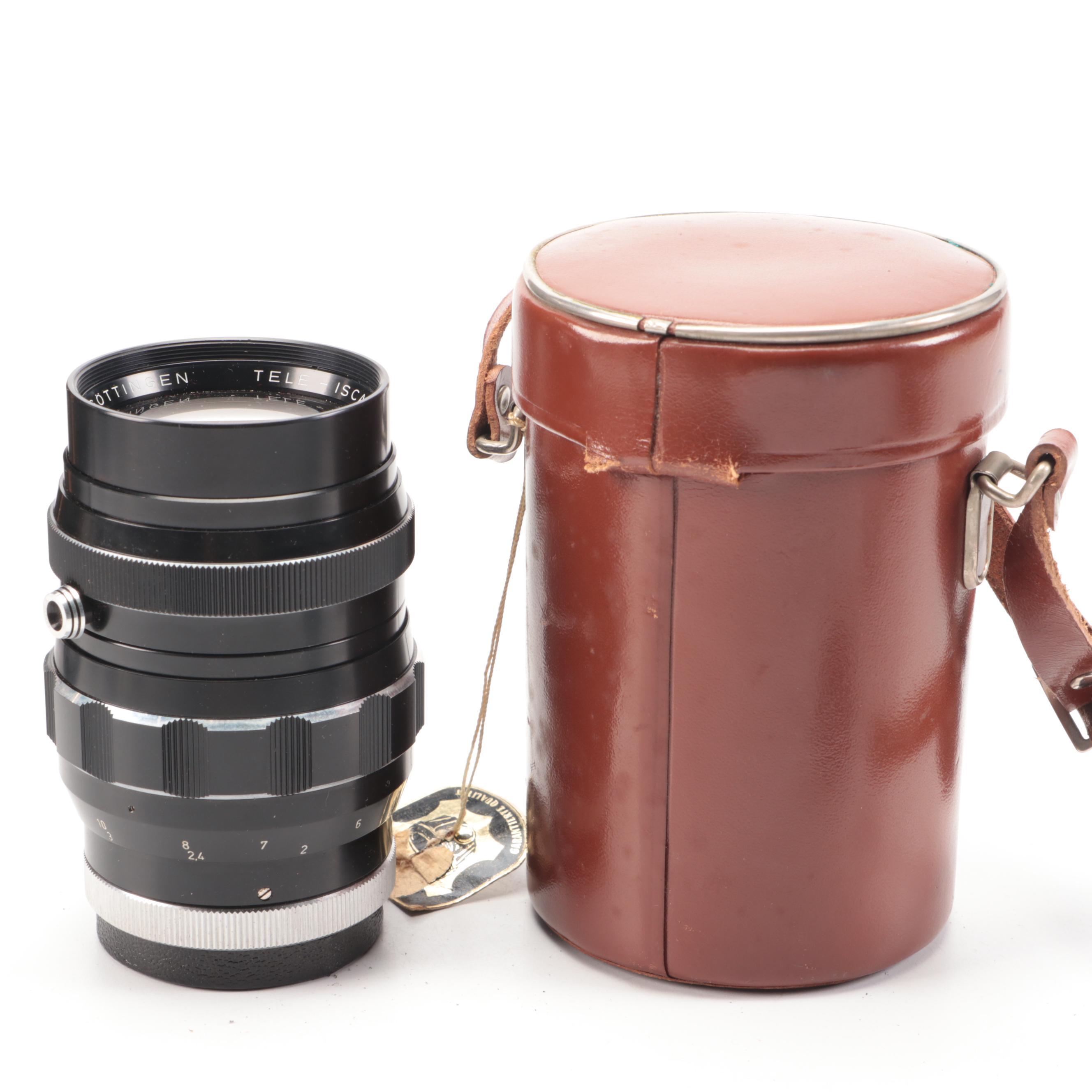 Bell & Howell / Canon FX 35mm Camera with Collection of Lenses, Leather Cases