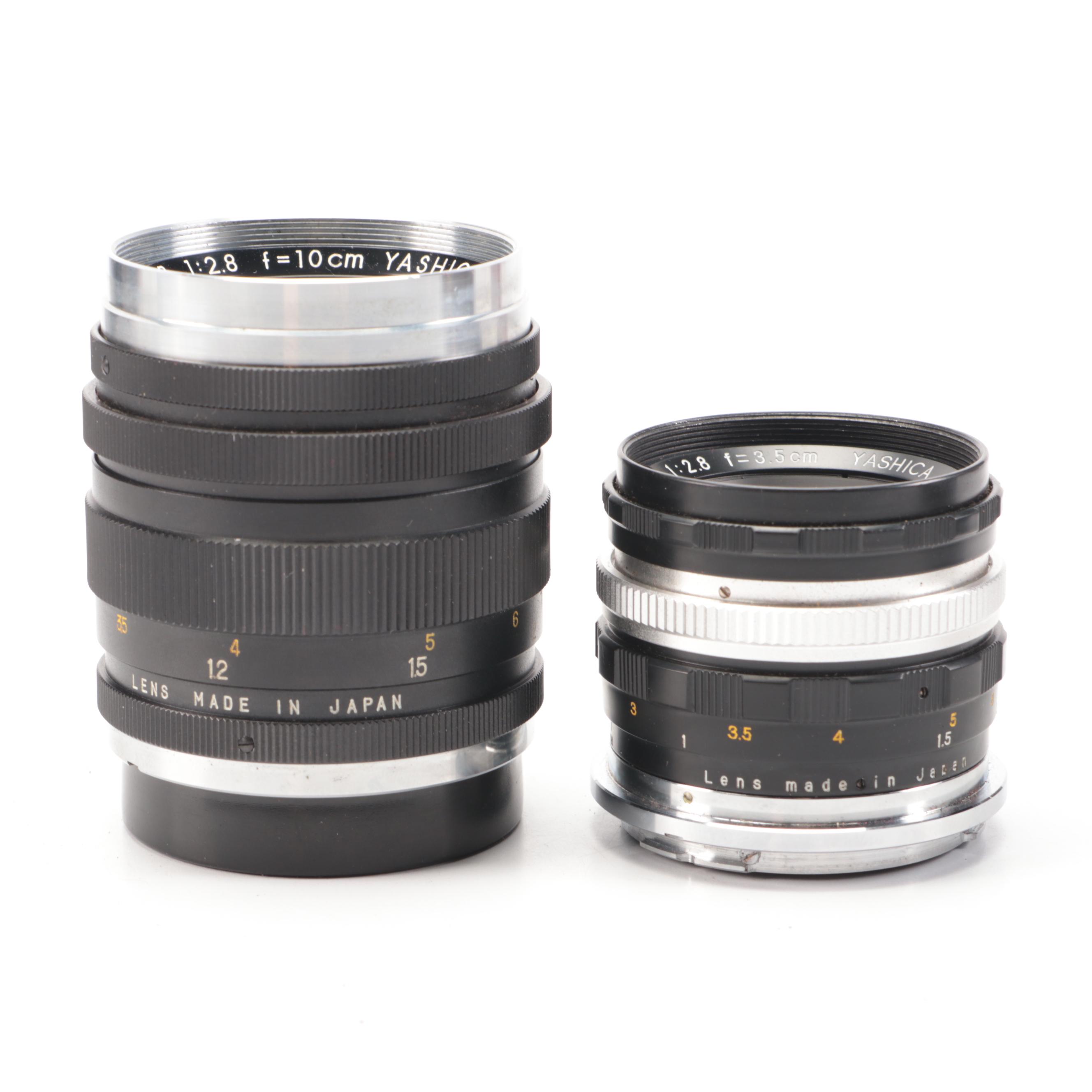 Bell & Howell / Canon FX 35mm Camera with Collection of Lenses, Leather Cases