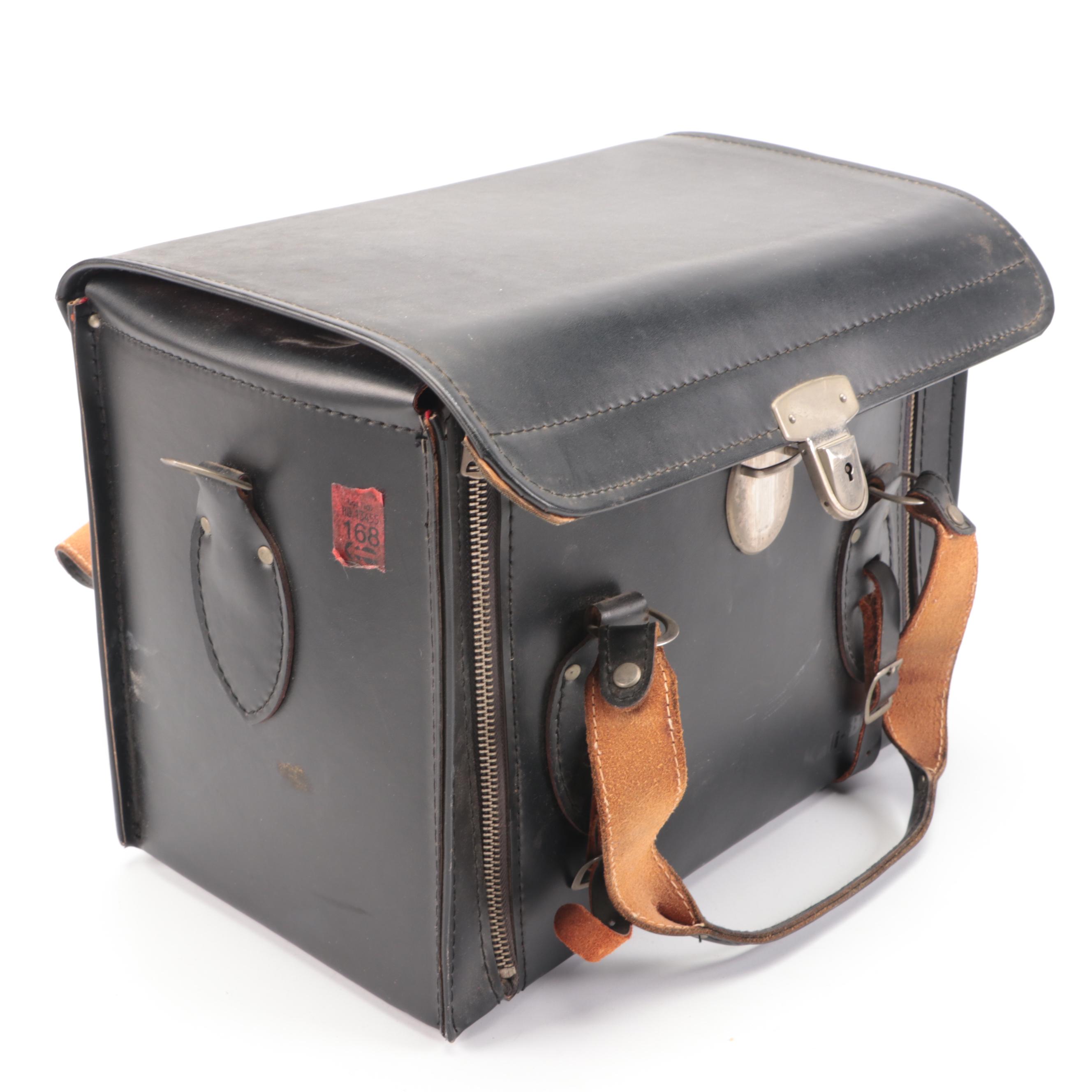 Bell & Howell / Canon FX 35mm Camera with Collection of Lenses, Leather Cases