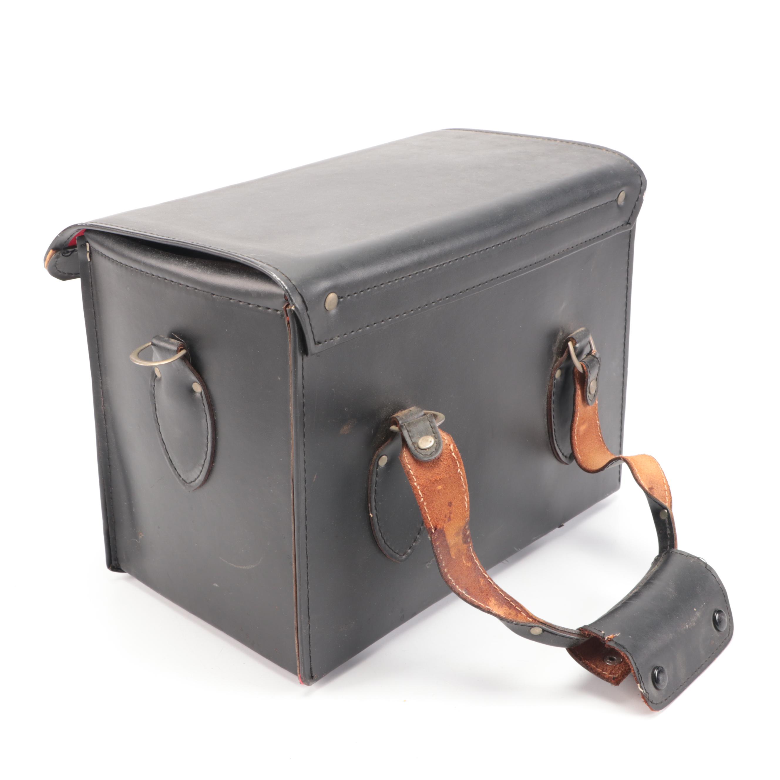 Bell & Howell / Canon FX 35mm Camera with Collection of Lenses, Leather Cases