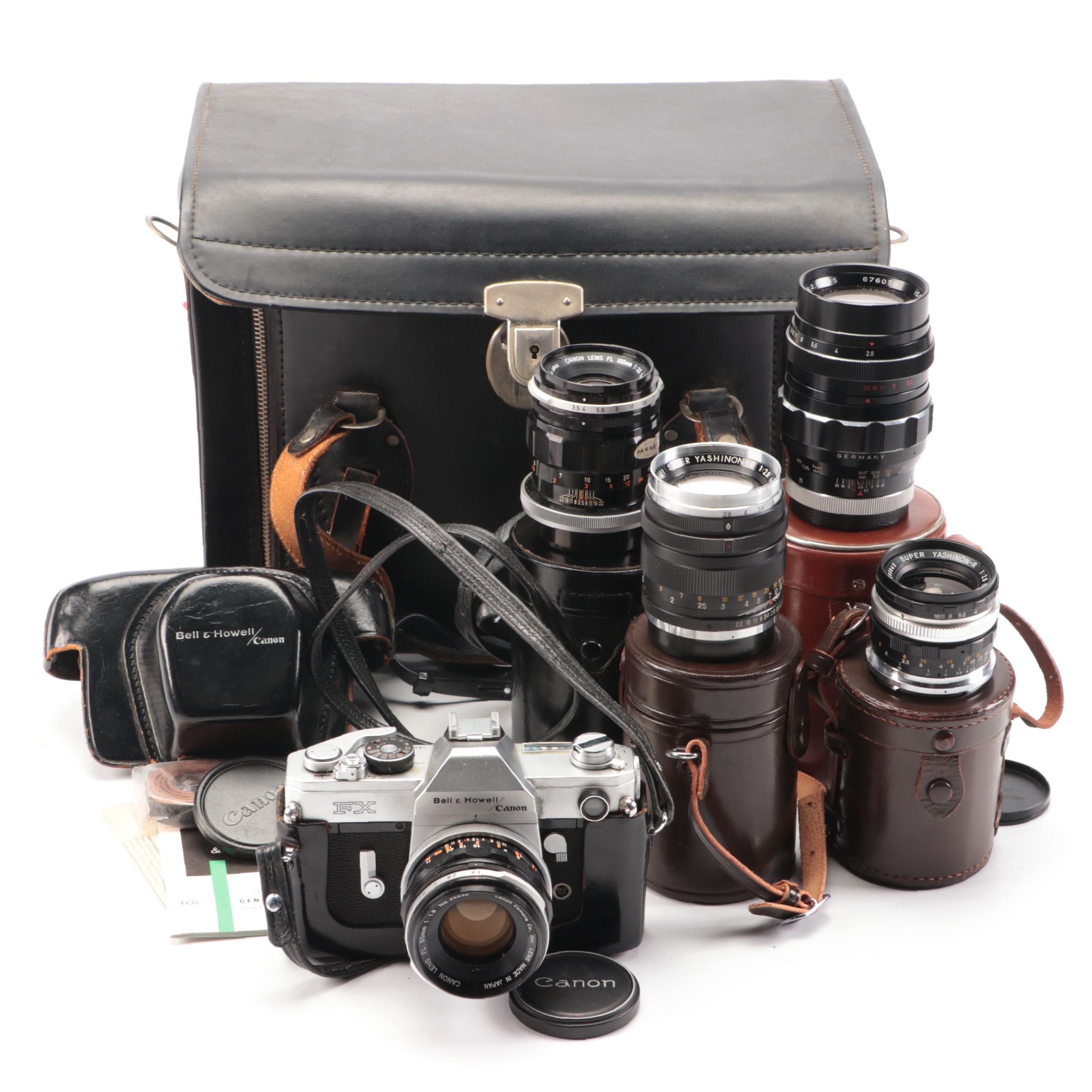 Bell & Howell / Canon FX 35mm Camera with Collection of Lenses, Leather Cases