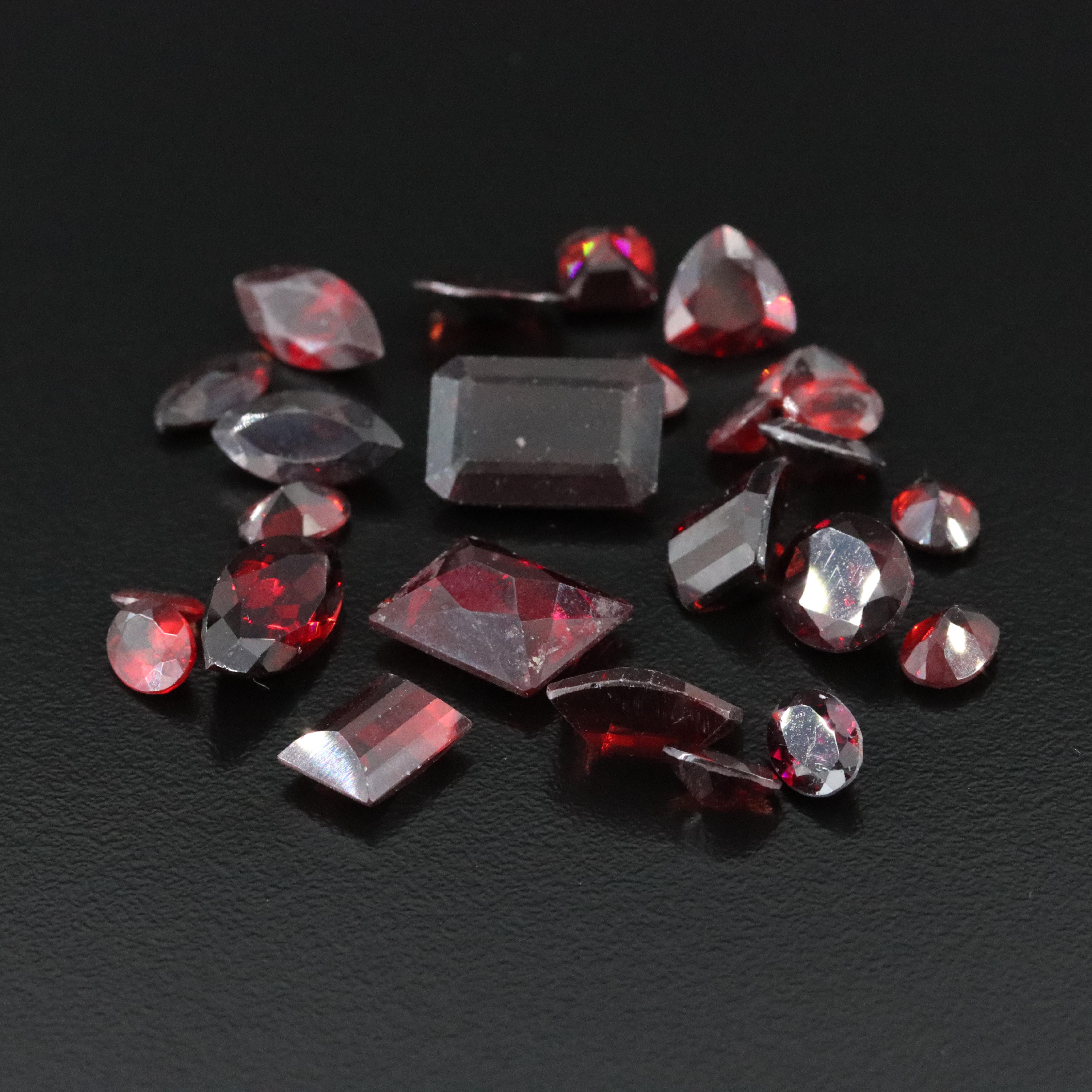 Loose 53.69 CTW Mixed Gemstone Lot with Garnet and Lab Grown Ruby